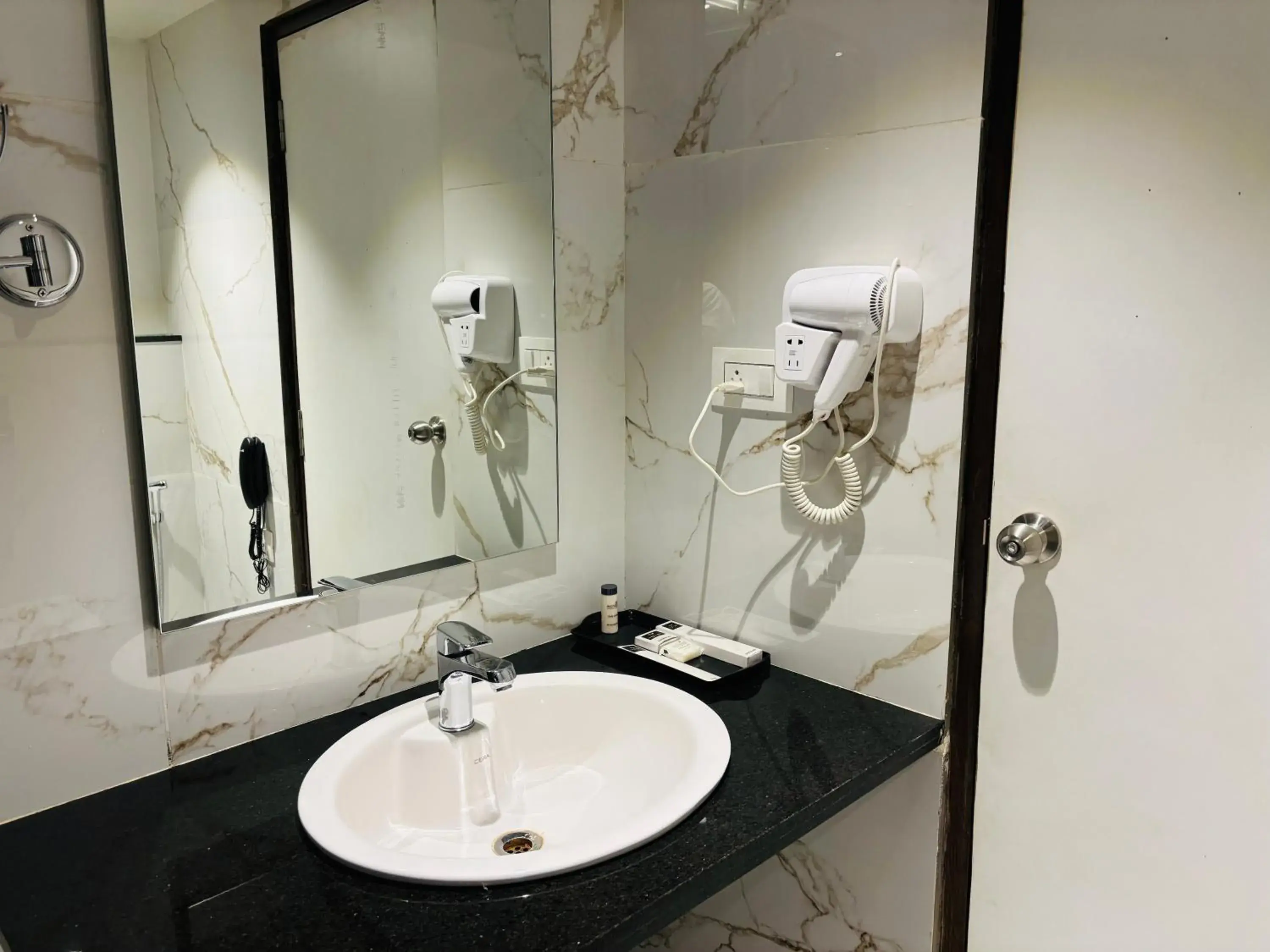 Bathroom in Mayur Belgaum Presidency Hotel & Spa Bathroom in Mayur Belgaum Presidency Hotel & Spa