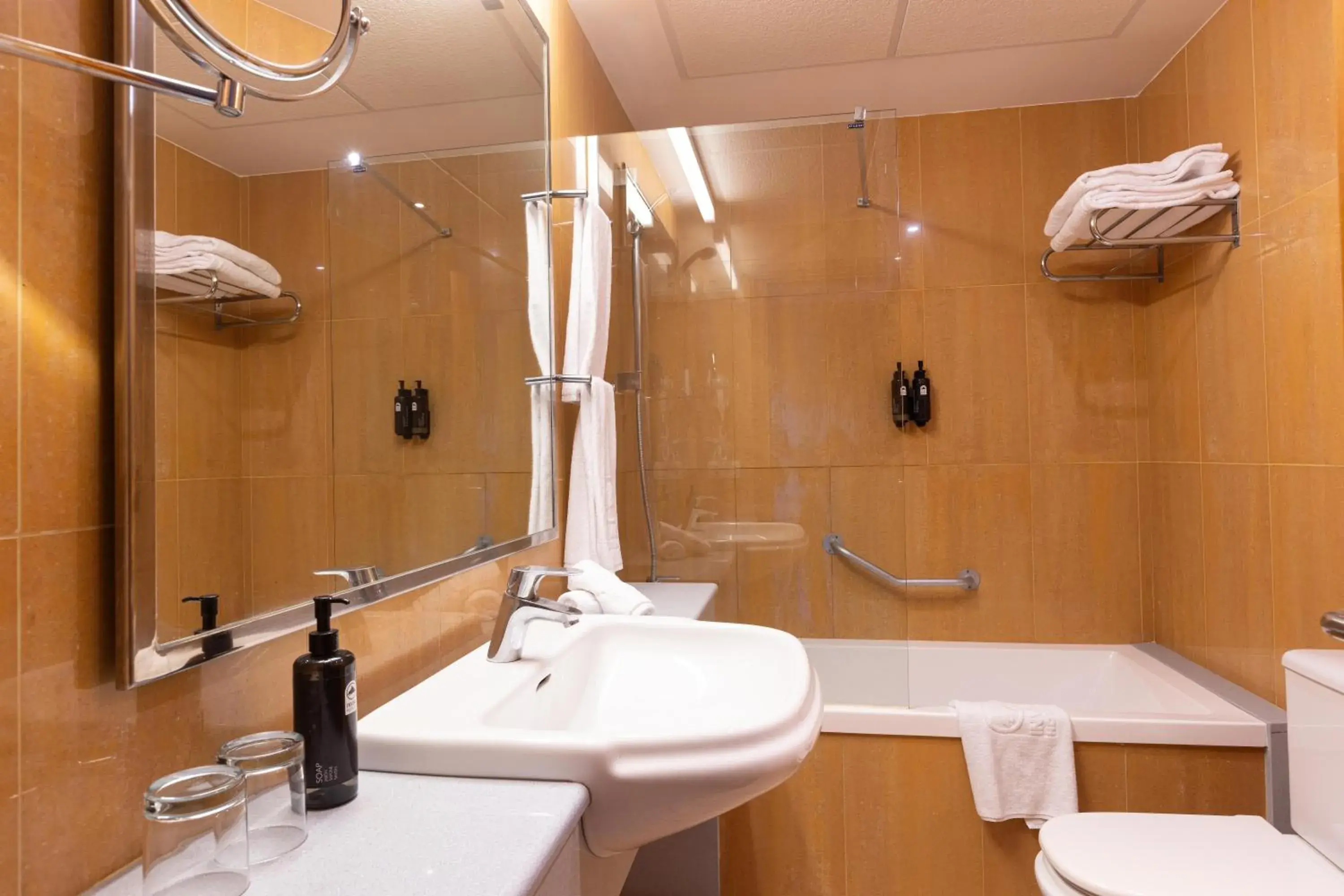 Bathroom in Invisa Hotel La Cala Bathroom in Invisa Hotel La Cala