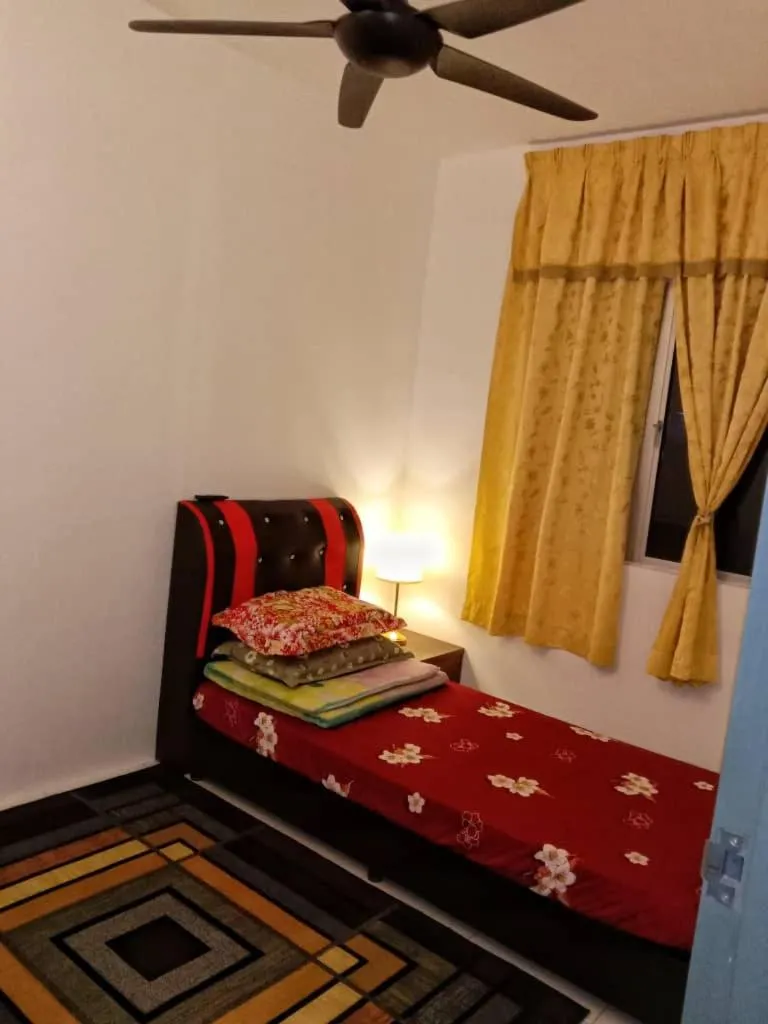 Bed in AWANA HOMESTAY