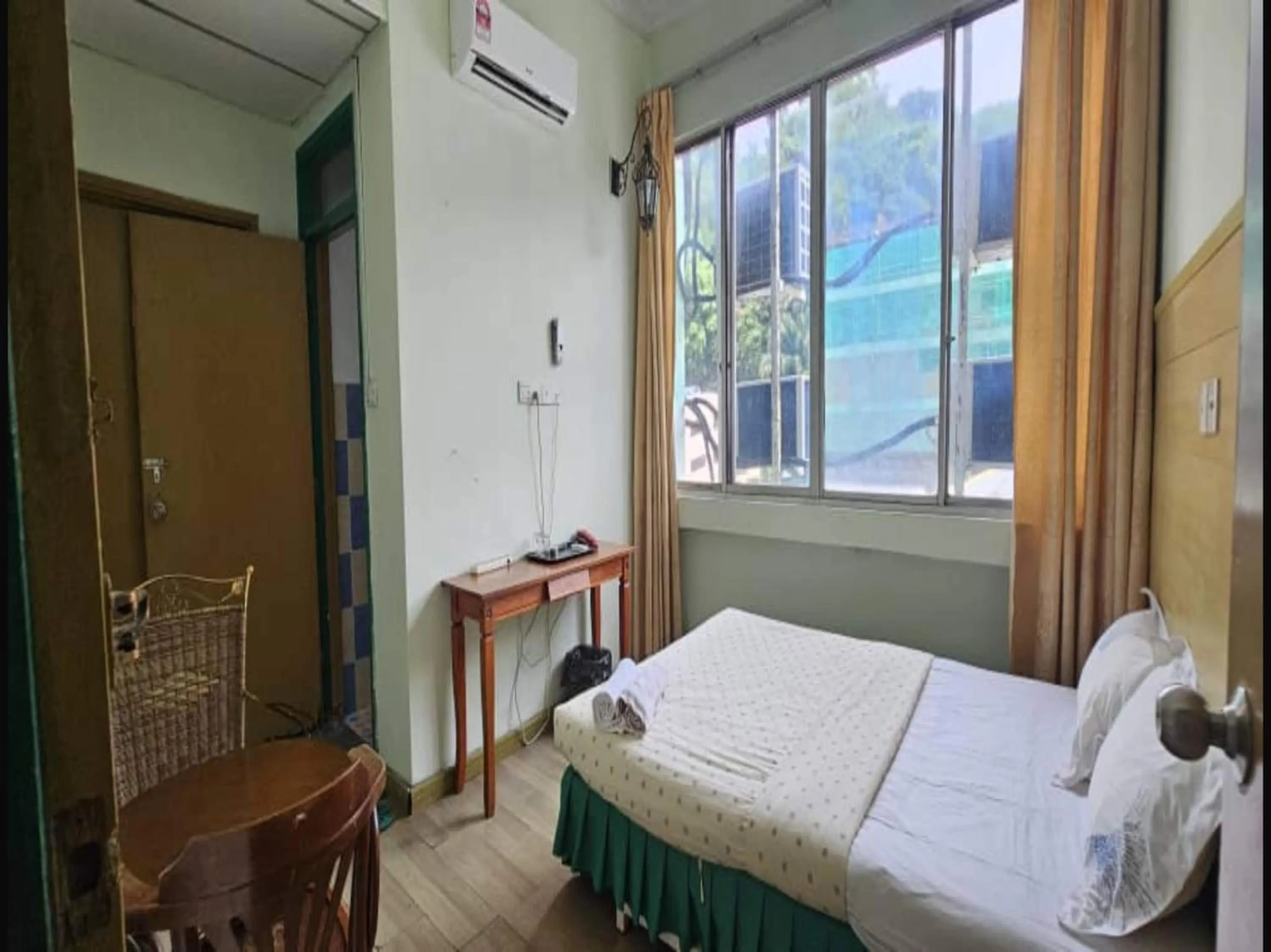 Bedroom in Hotel O Sianglory Inn