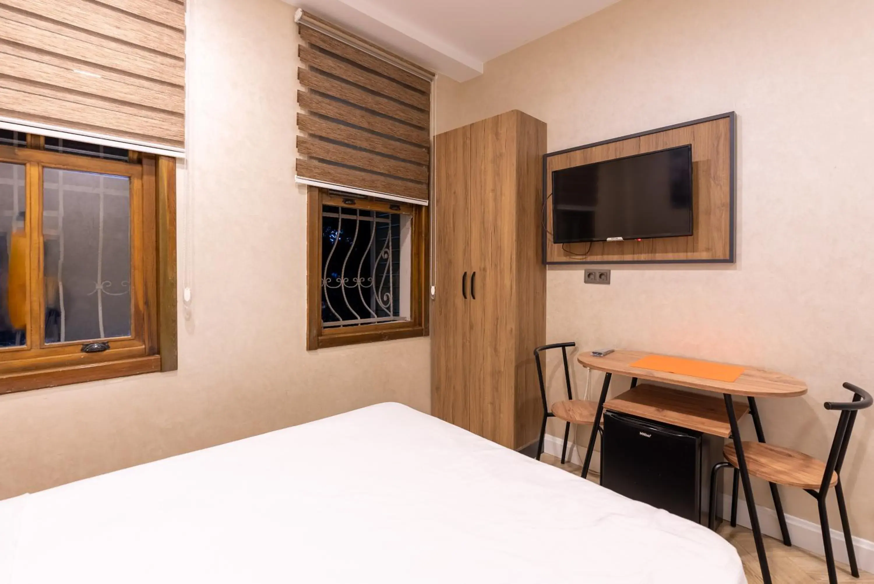 Communal lounge/ TV room, Bed in Valens Boutique Hotel Communal lounge/ TV room, Bed in Valens Boutique Hotel