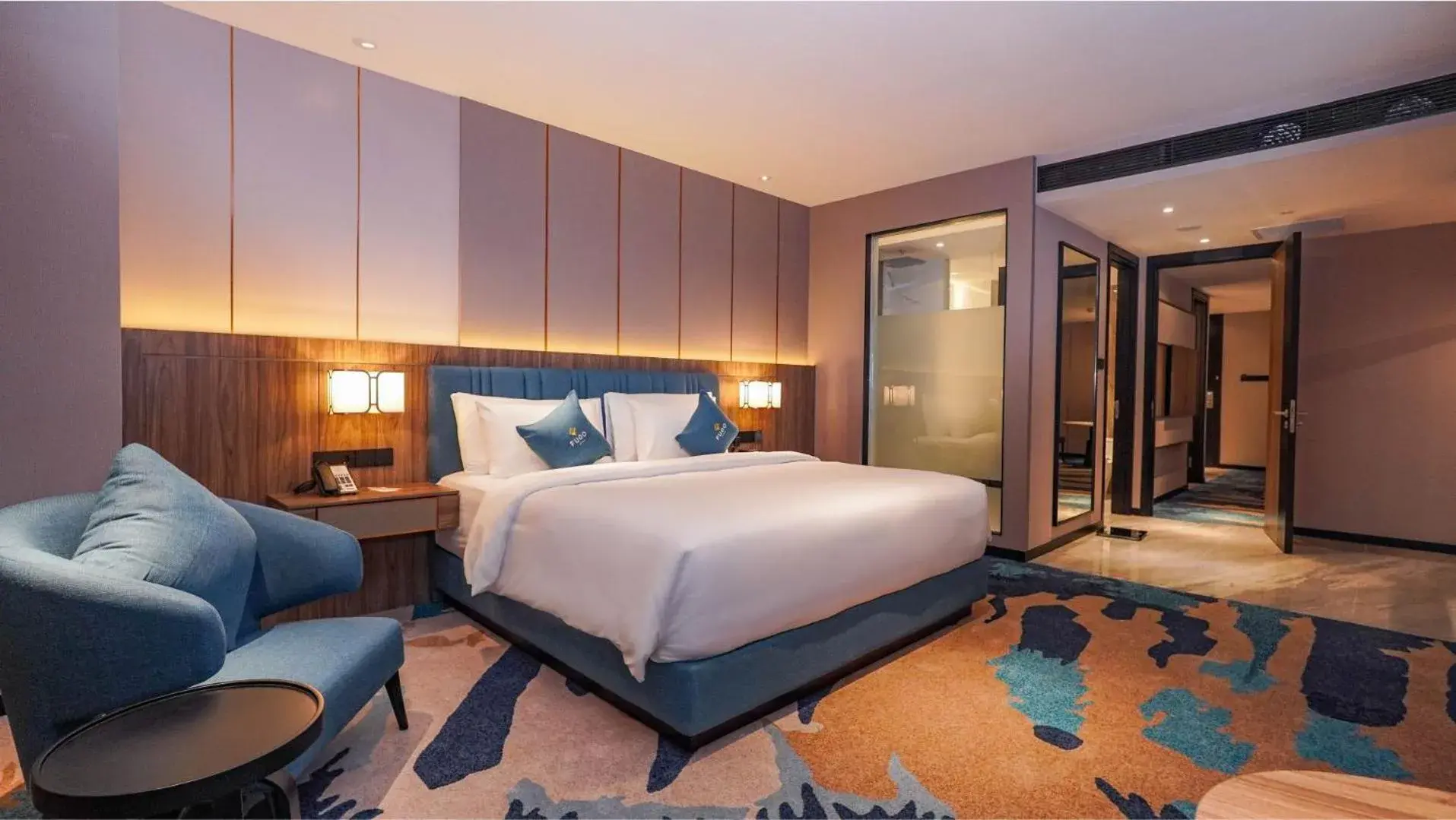 Bed in FUGO Hotel Samarinda Bed in FUGO Hotel Samarinda