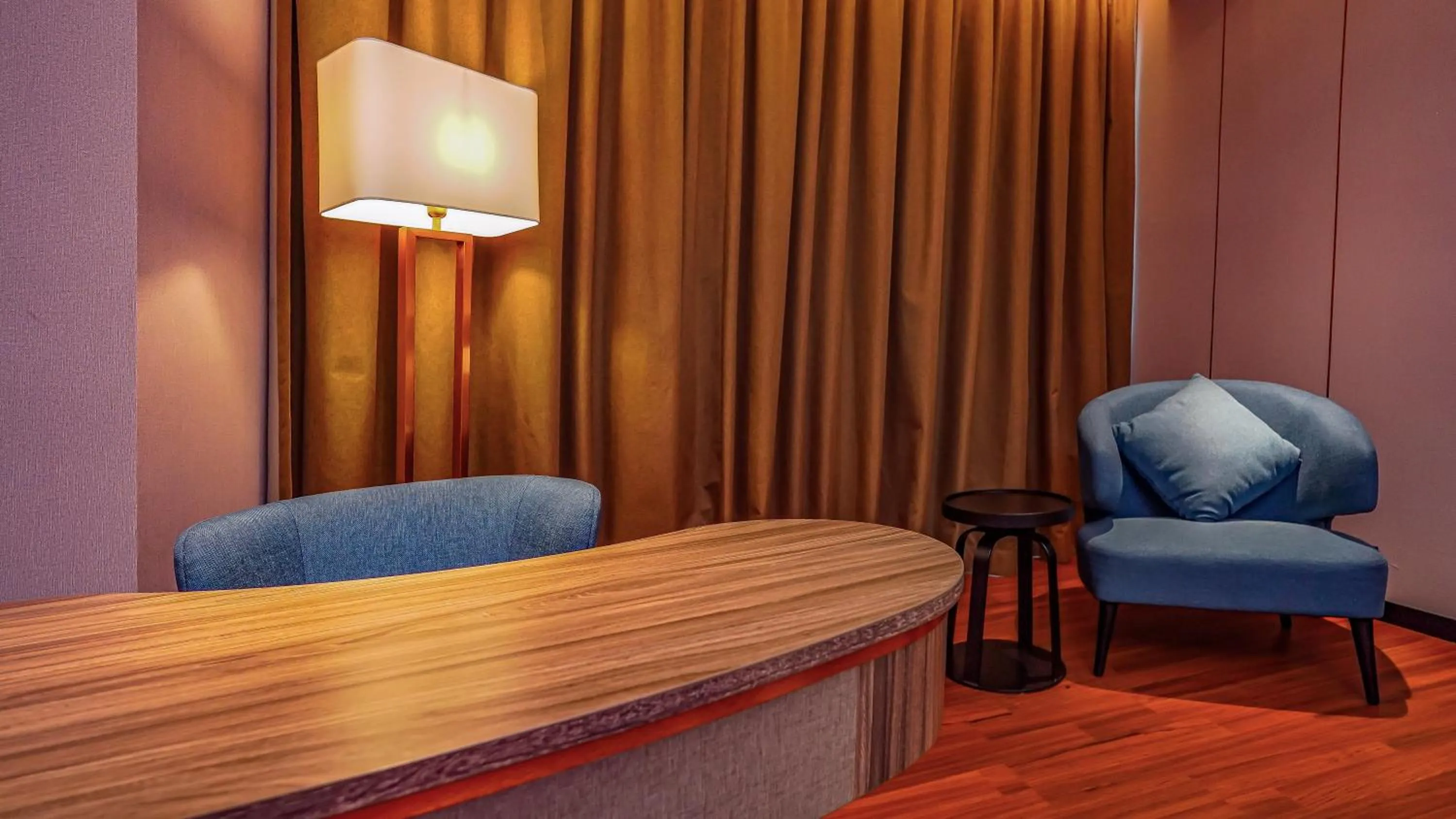 Seating area in FUGO Hotel Samarinda