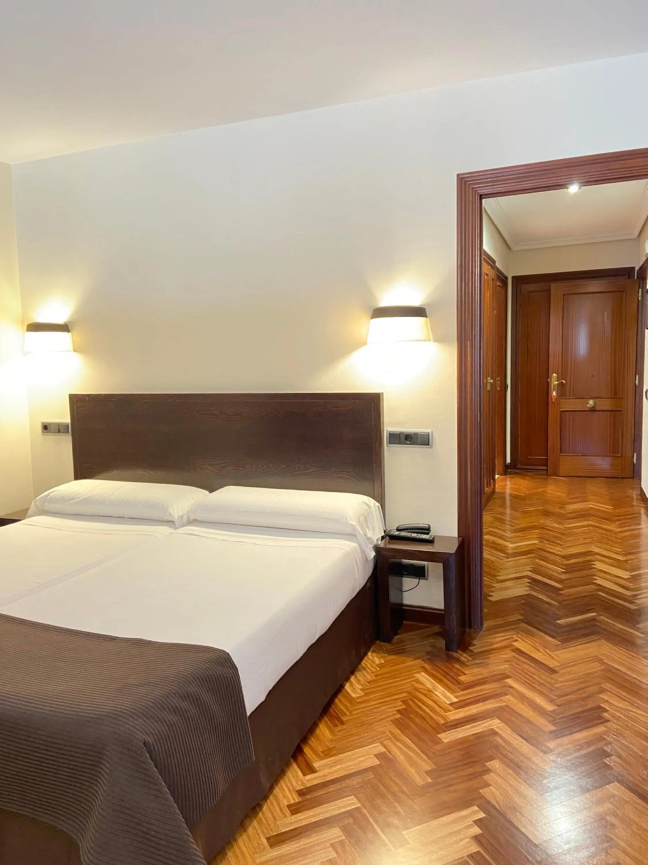 Bed in Hotel La Arquera