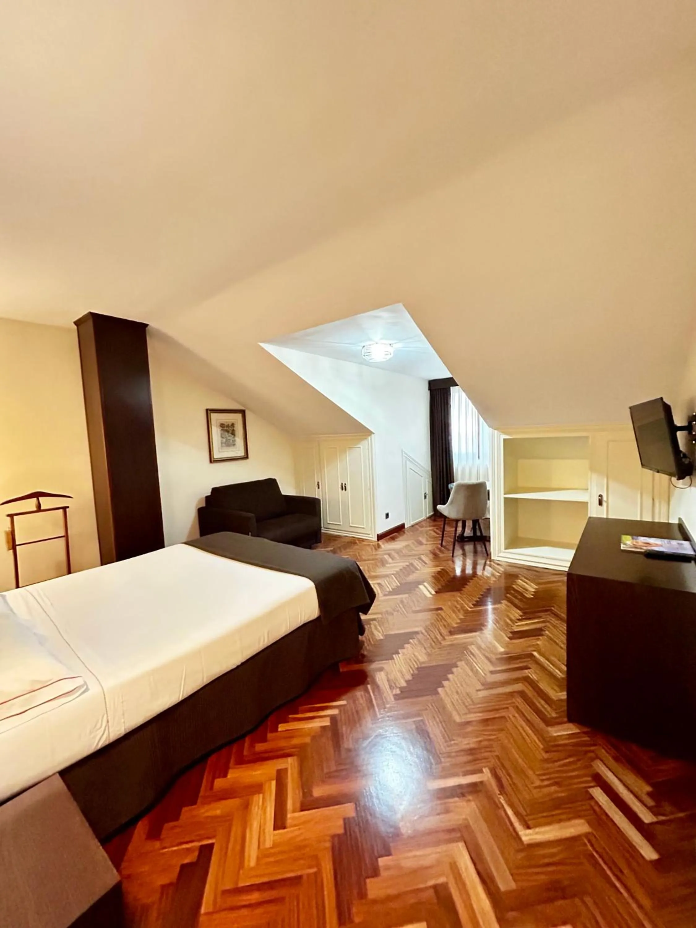 Bedroom in Hotel La Arquera