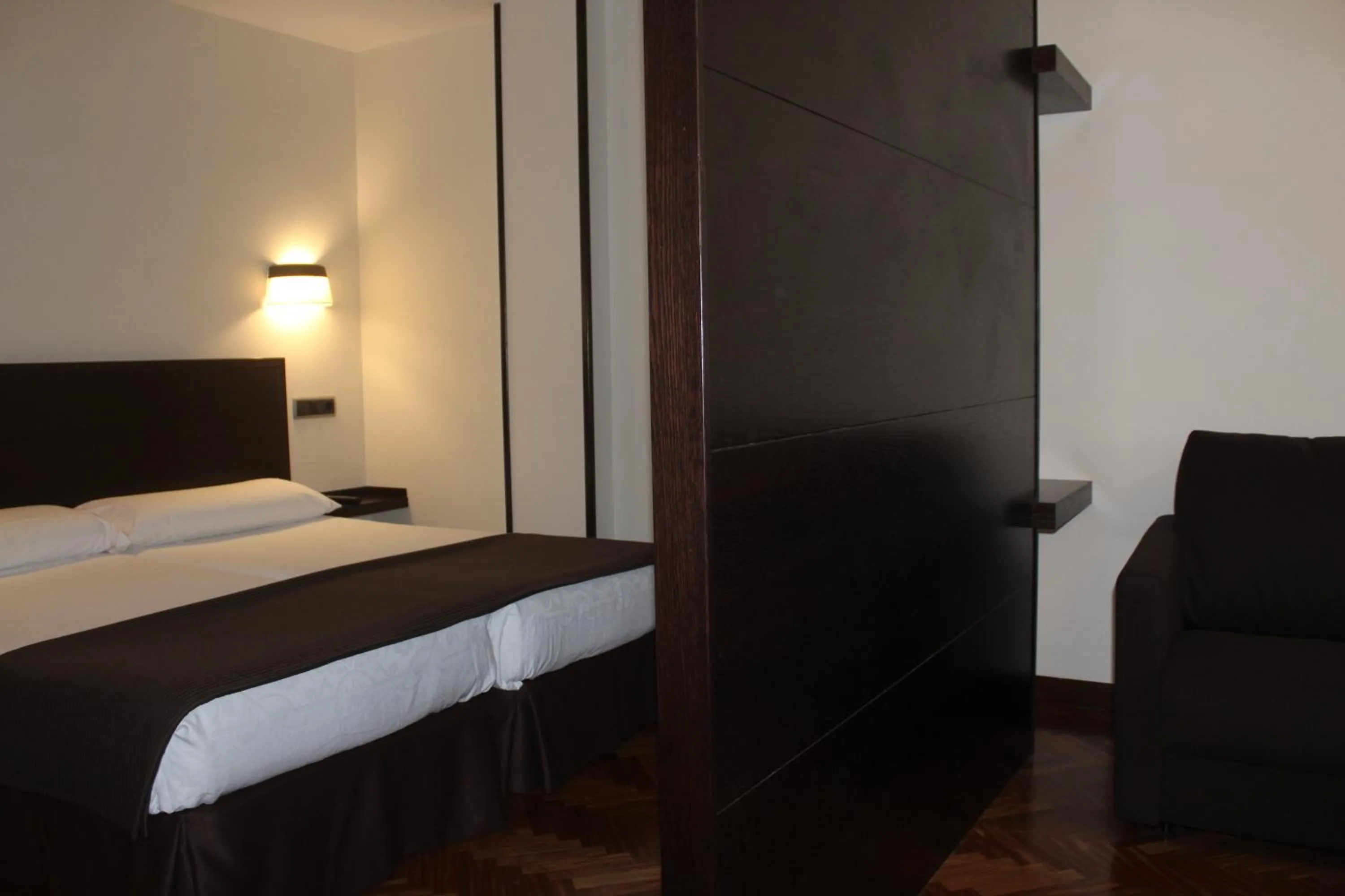 Bed in Hotel La Arquera