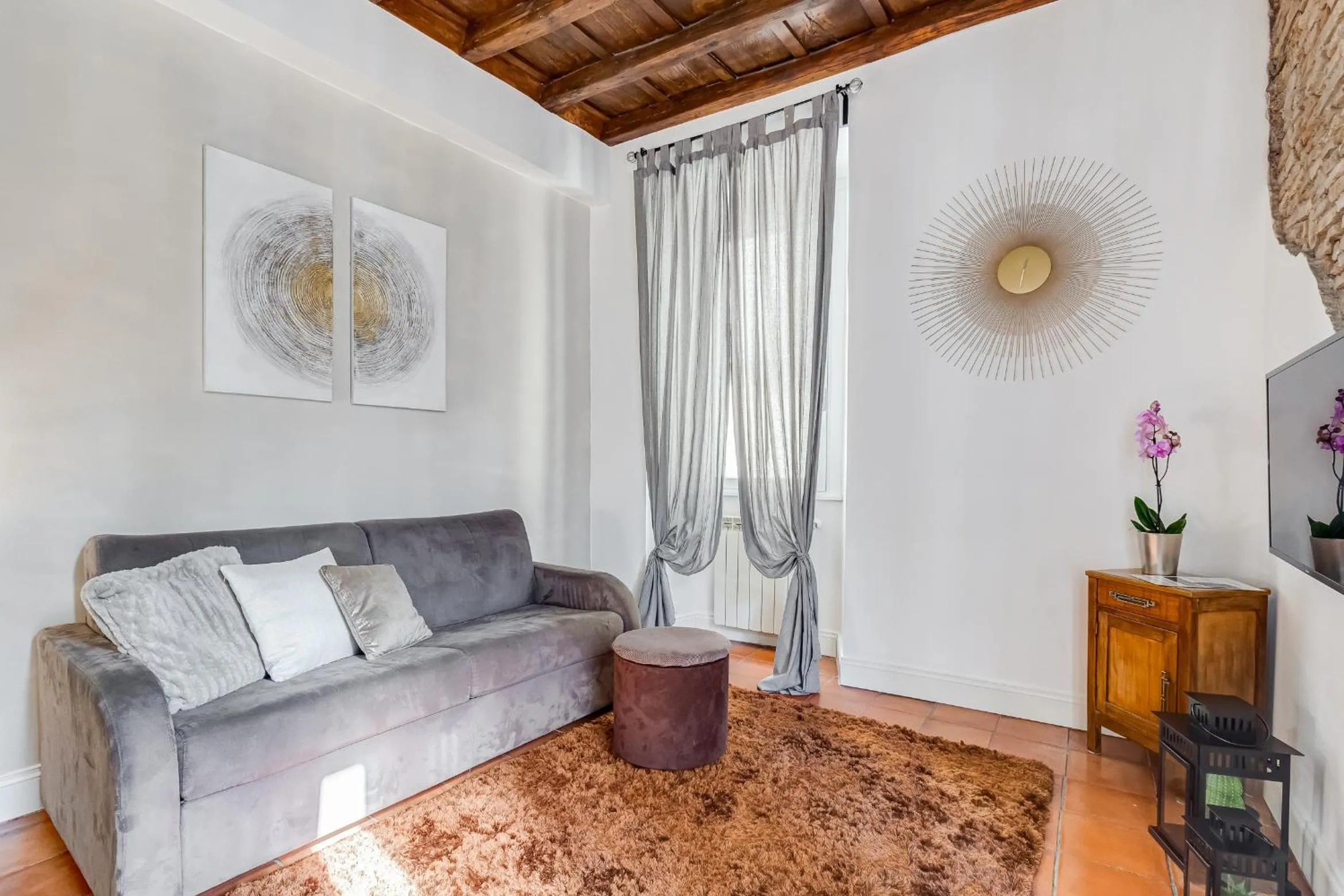 Living room in Campo dei fiori Royal Orchid apartment