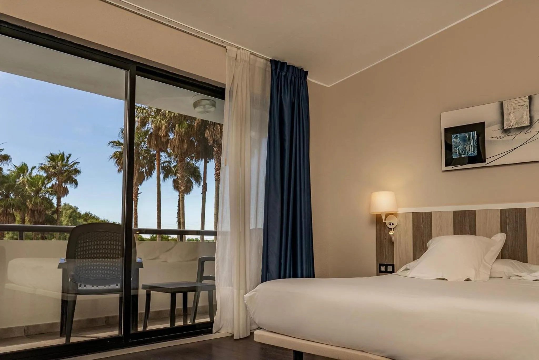 View (from property/room), Bed in Hotel La Palma de Llanes