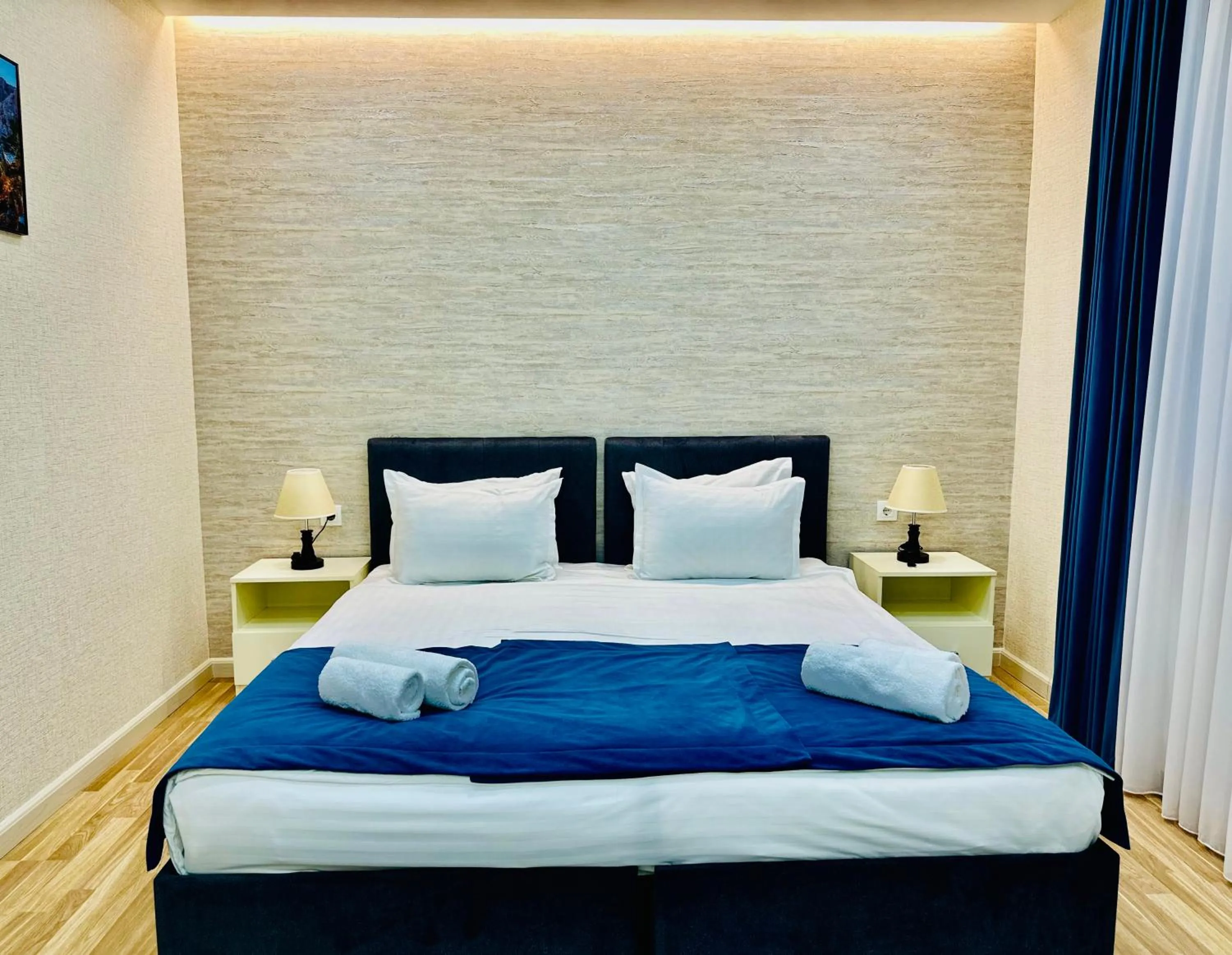 Bed in Novza Palace Hotel