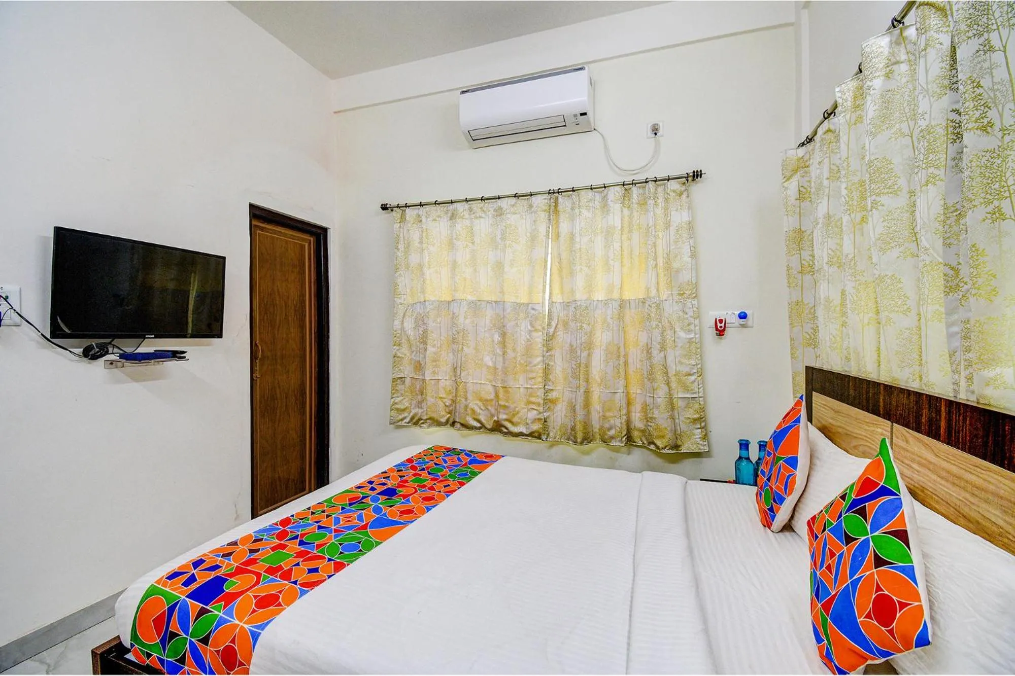 Bed in FabExpress Moon Residency