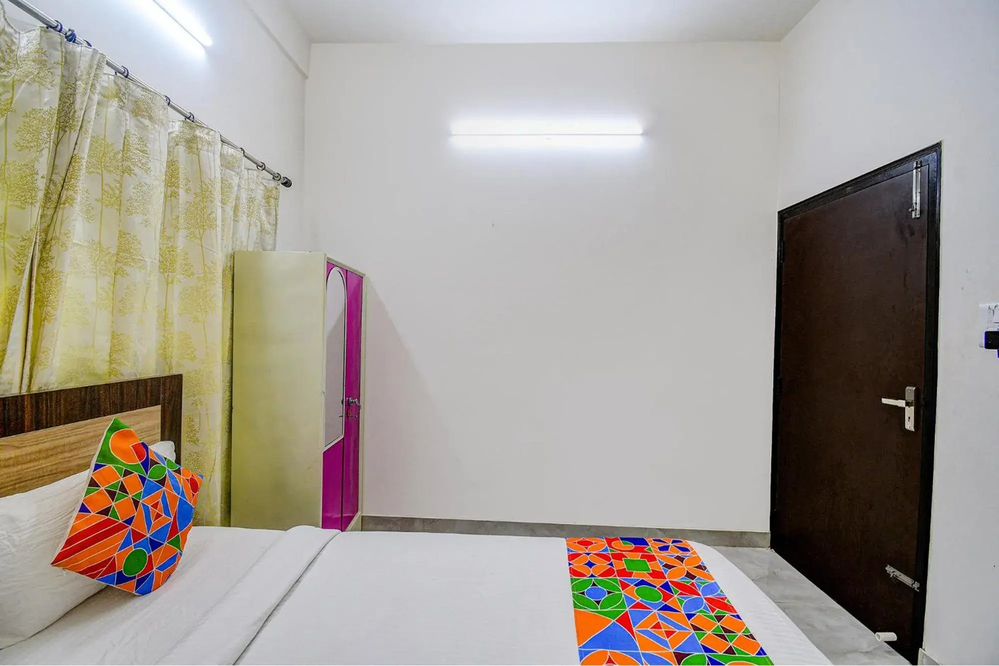 Bed in FabHotel Moon Residency Bed in FabHotel Moon Residency