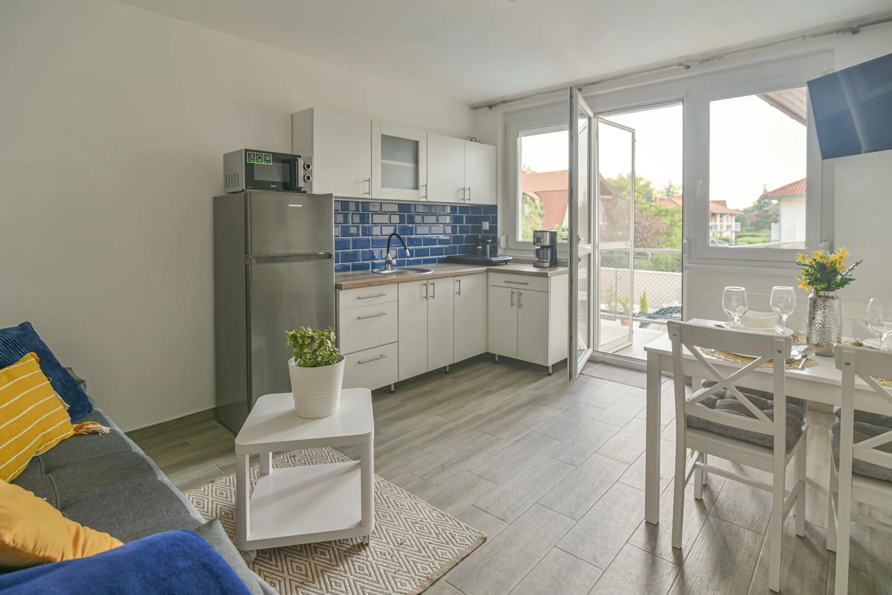 Kitchen or kitchenette in Happy Apartments