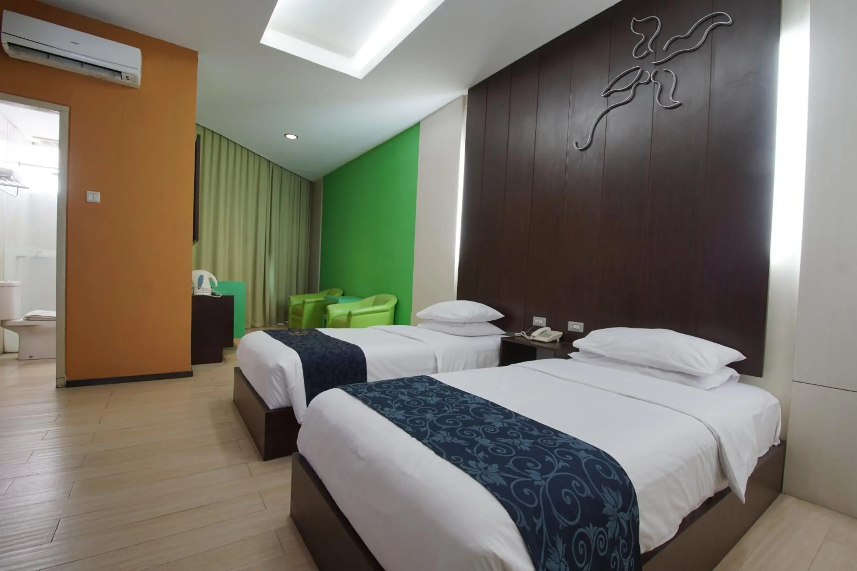 Bed in Hotel Puri Garden