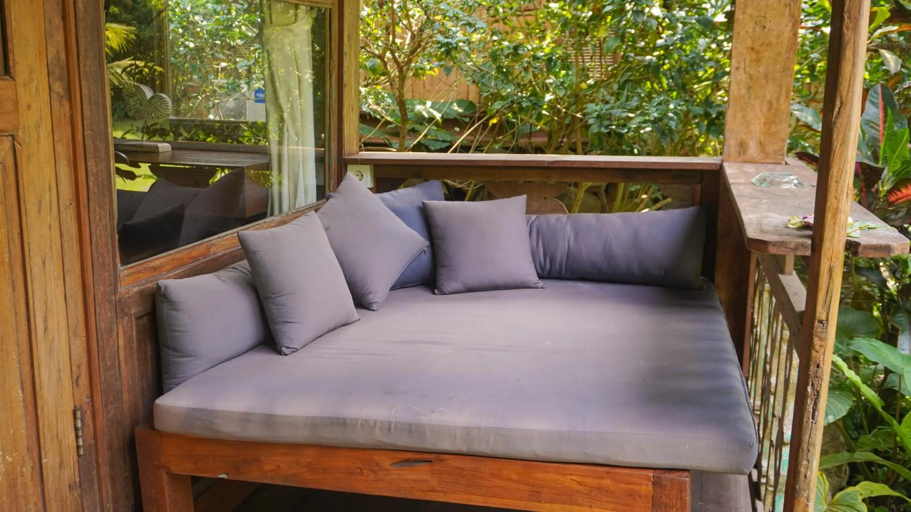 Seating area in Green Tree House Villa Ubud