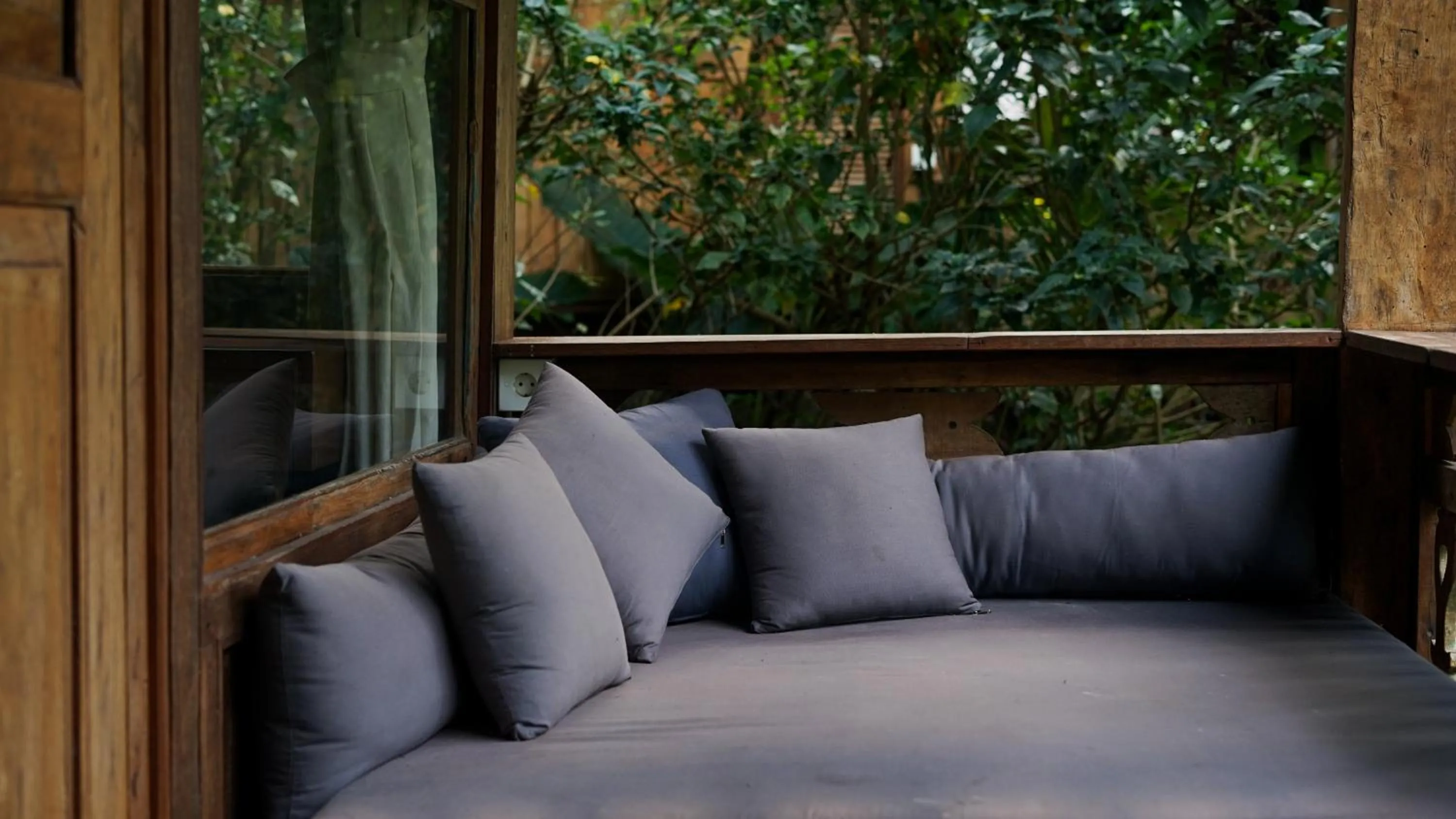 Seating area in Green Tree House Villa Ubud