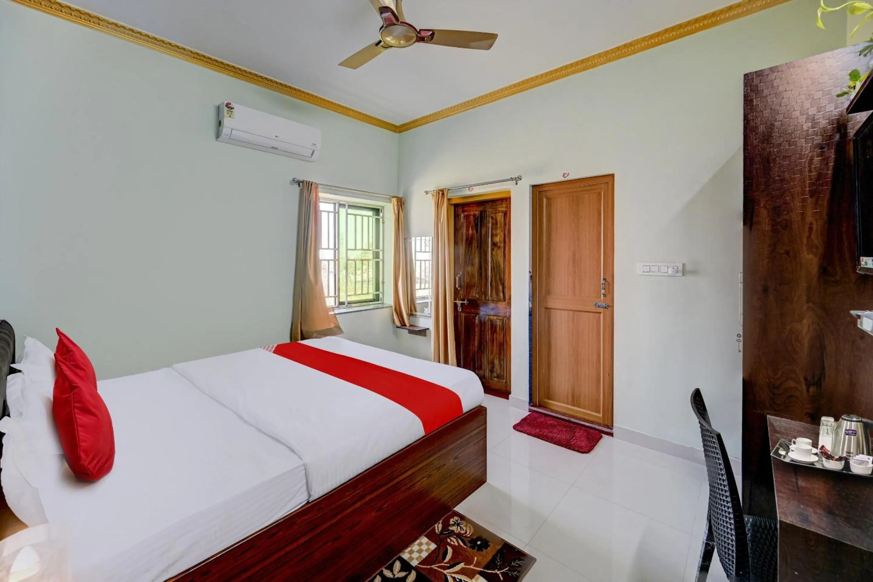 Bedroom in Hotel O GD STAY INN 1