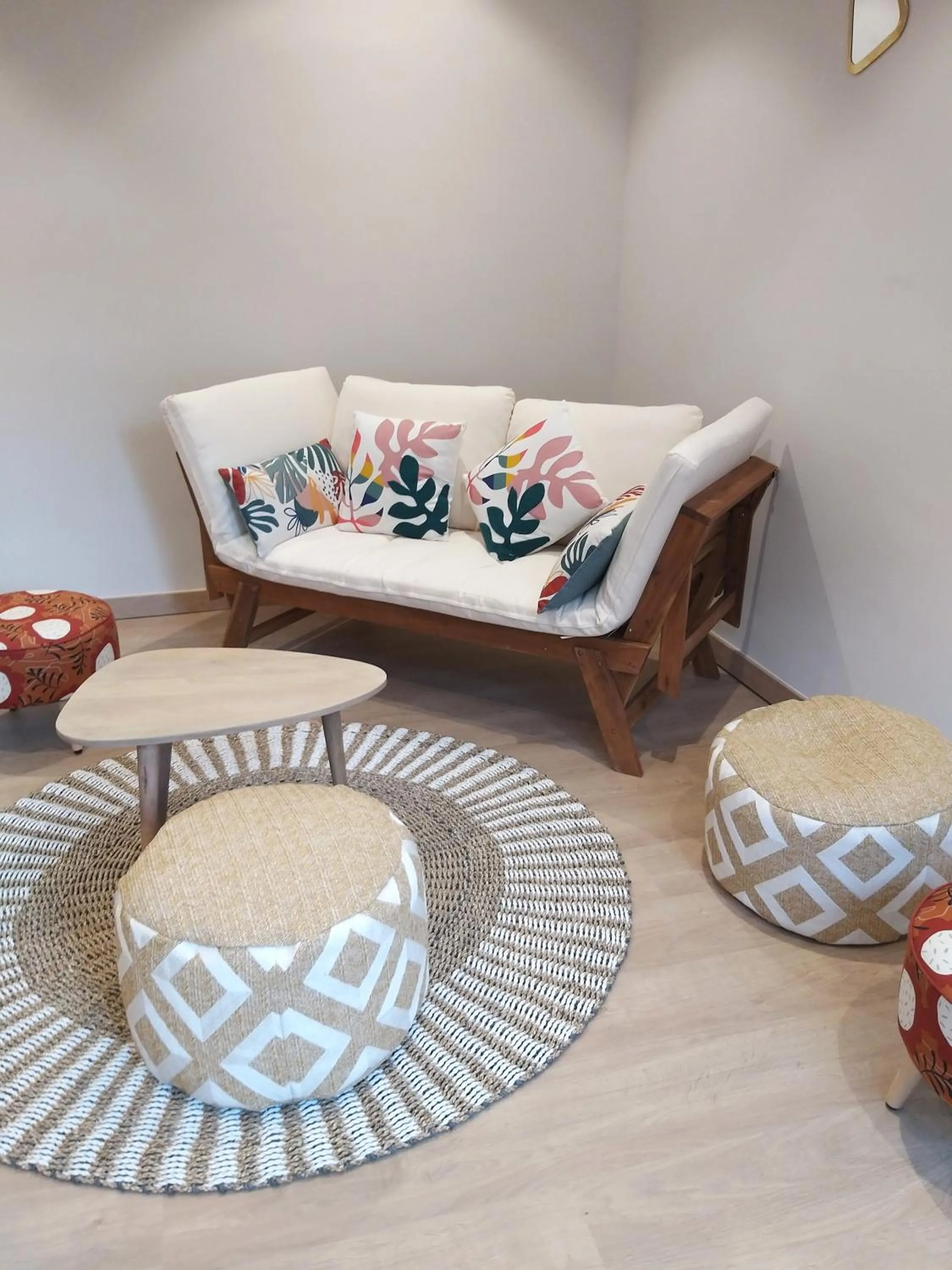 Communal lounge/ TV room in Intense Boutik-Hôtel