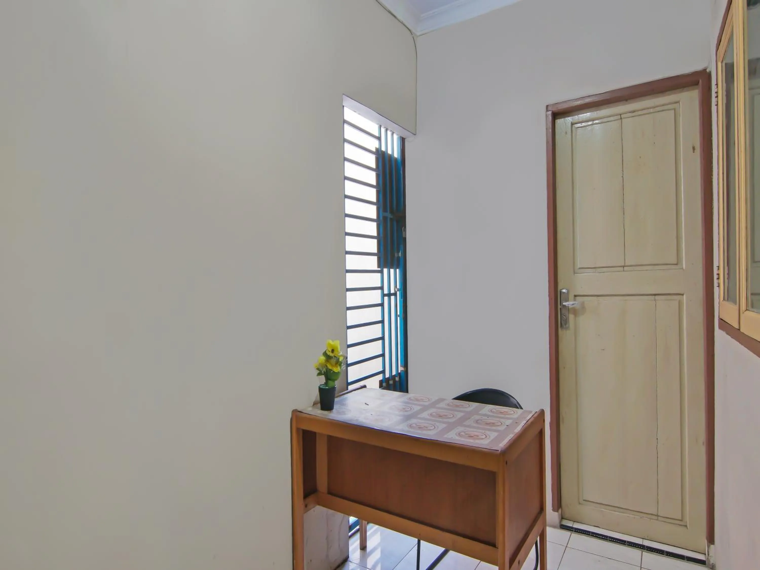 Lobby or reception in Hotel O Flamboyan 25 Homestay Syariah