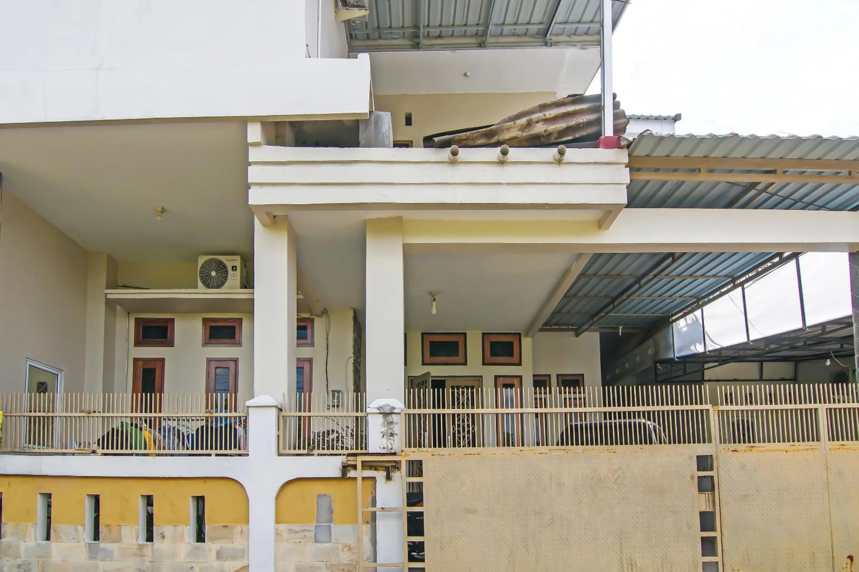 Facade/entrance in Hotel O Flamboyan 25 Homestay Syariah