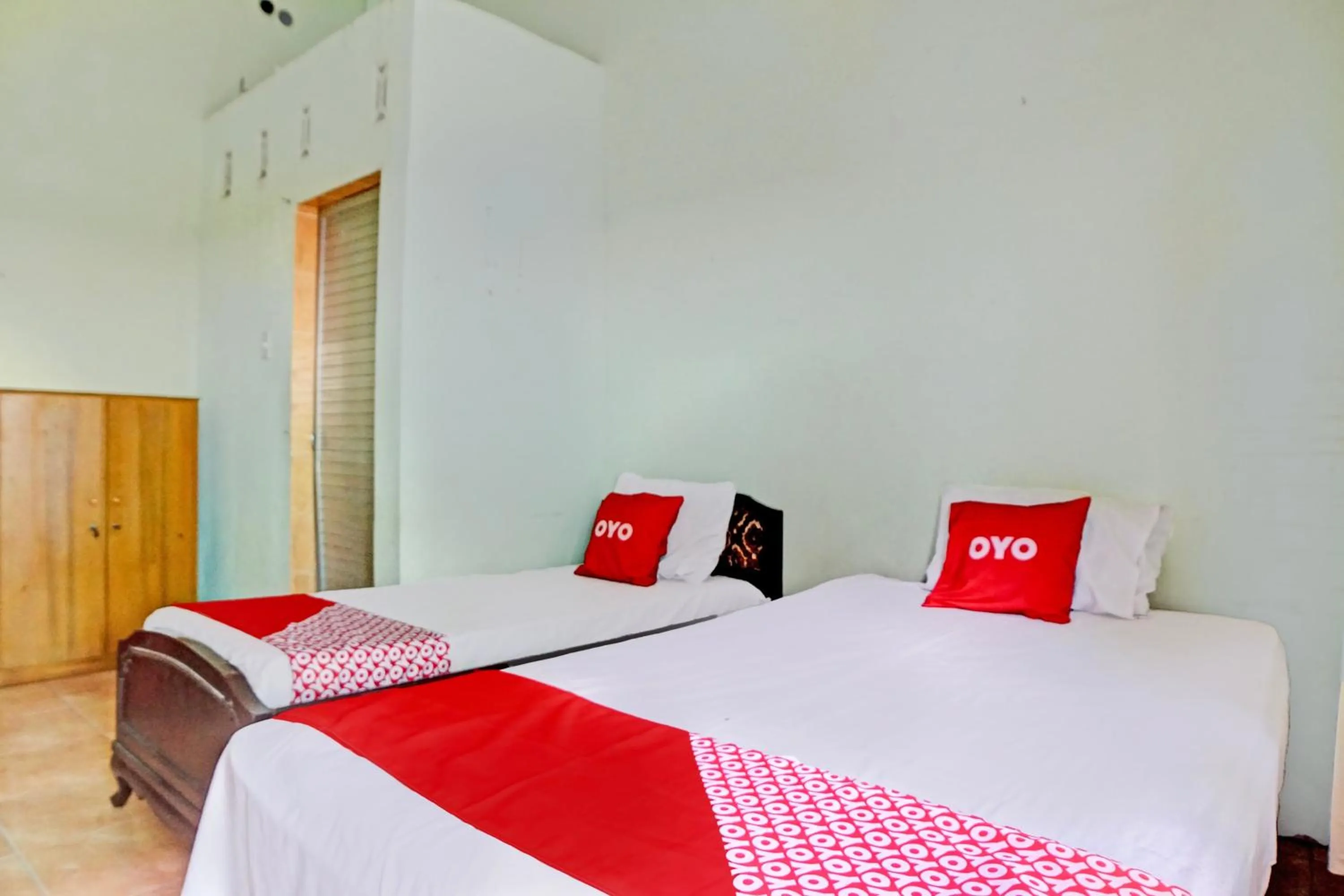 Bedroom, Bed in Hotel O Onasis Syariah Inn