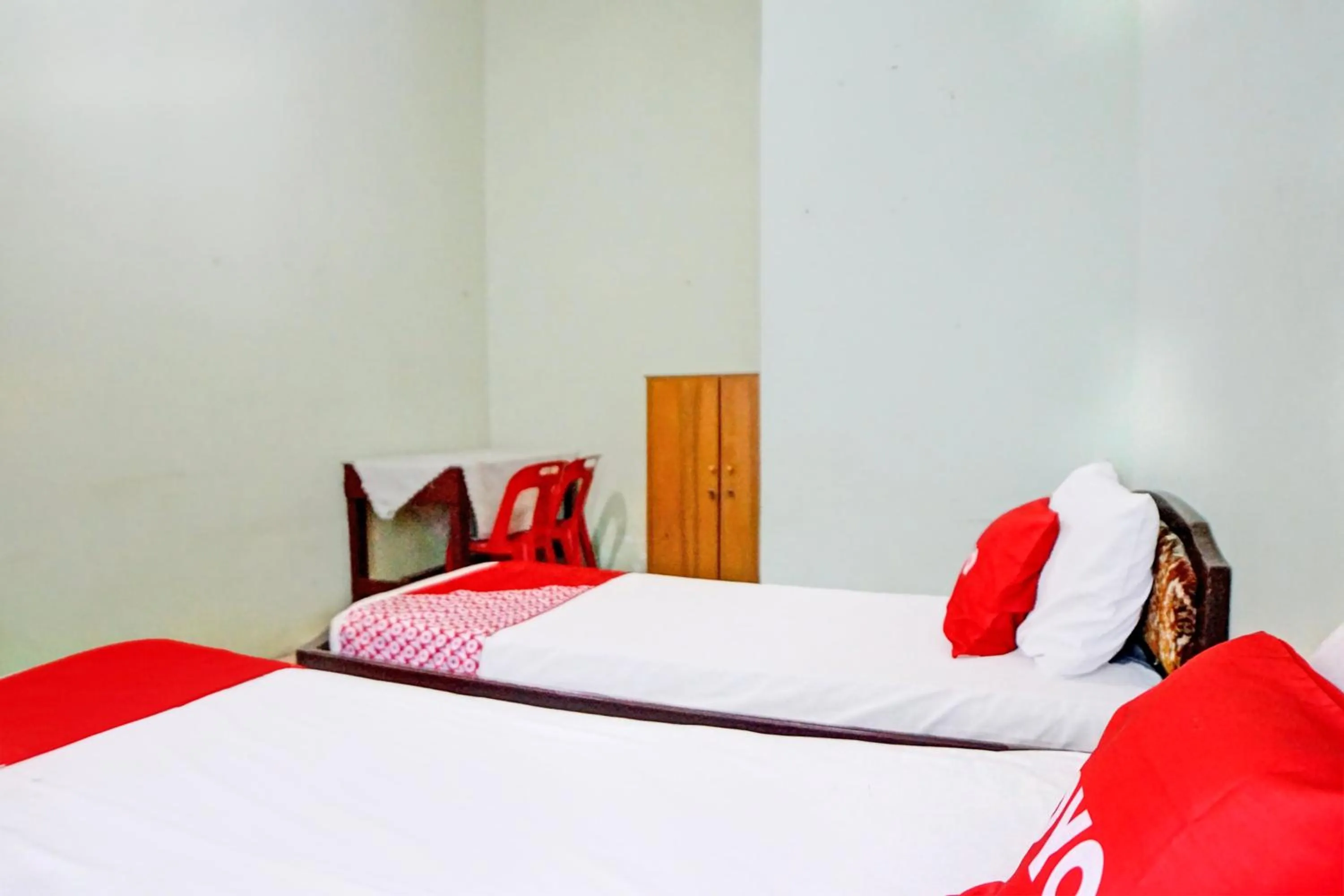 Bedroom, Bed in Hotel O Onasis Syariah Inn