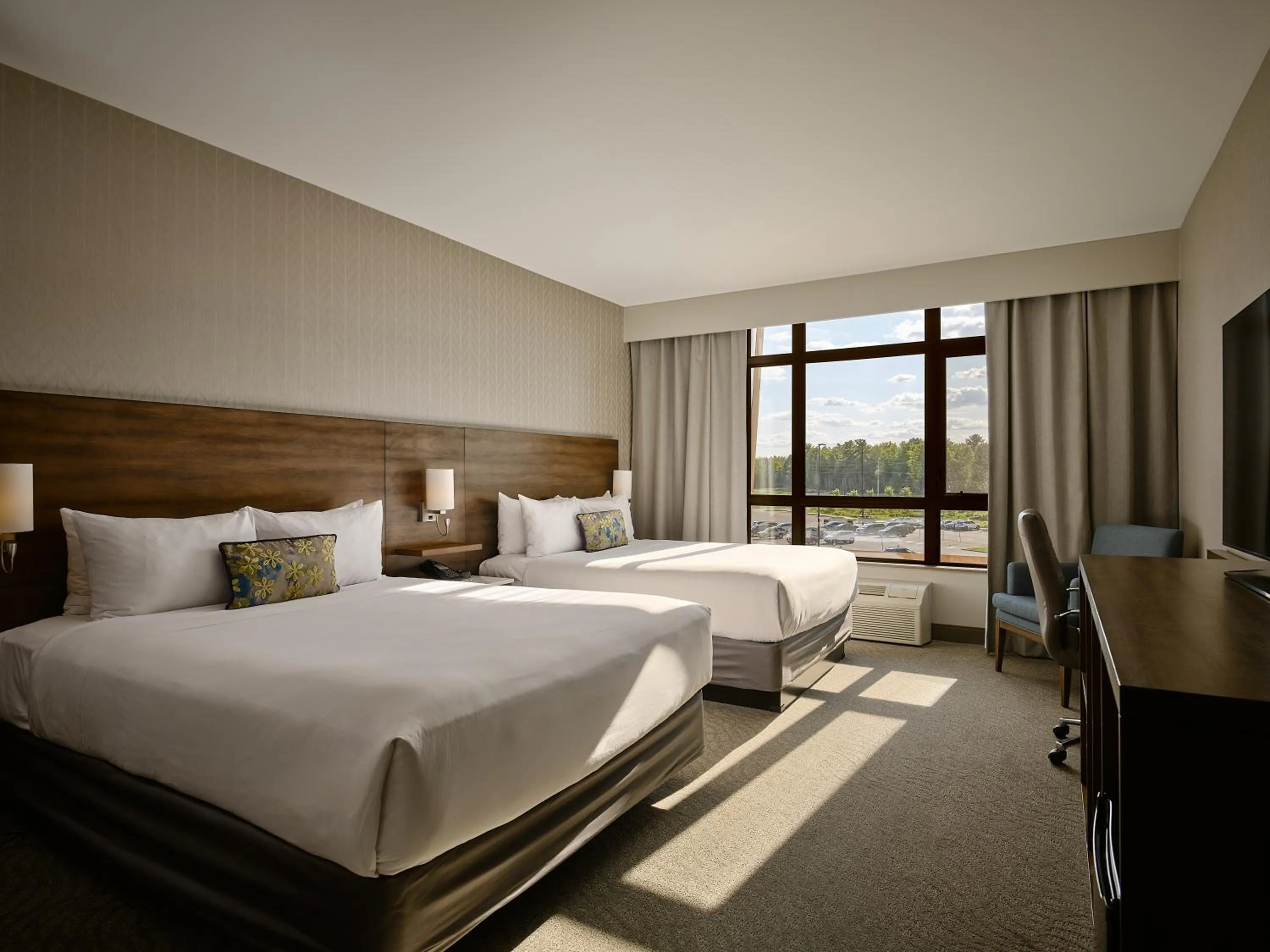 Bed in Great Blue Heron Hotel