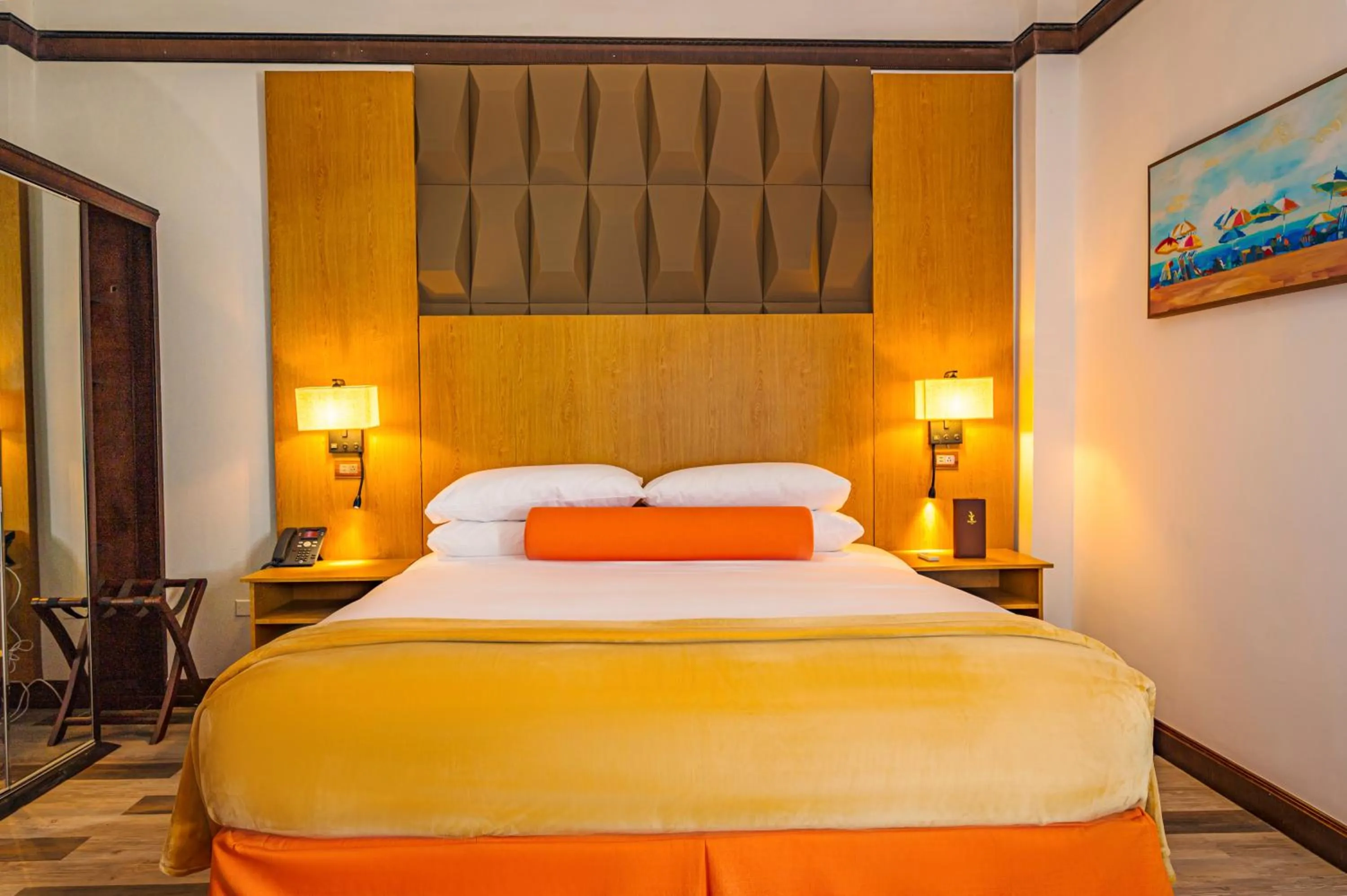 Bed in Sago Palm Hotel