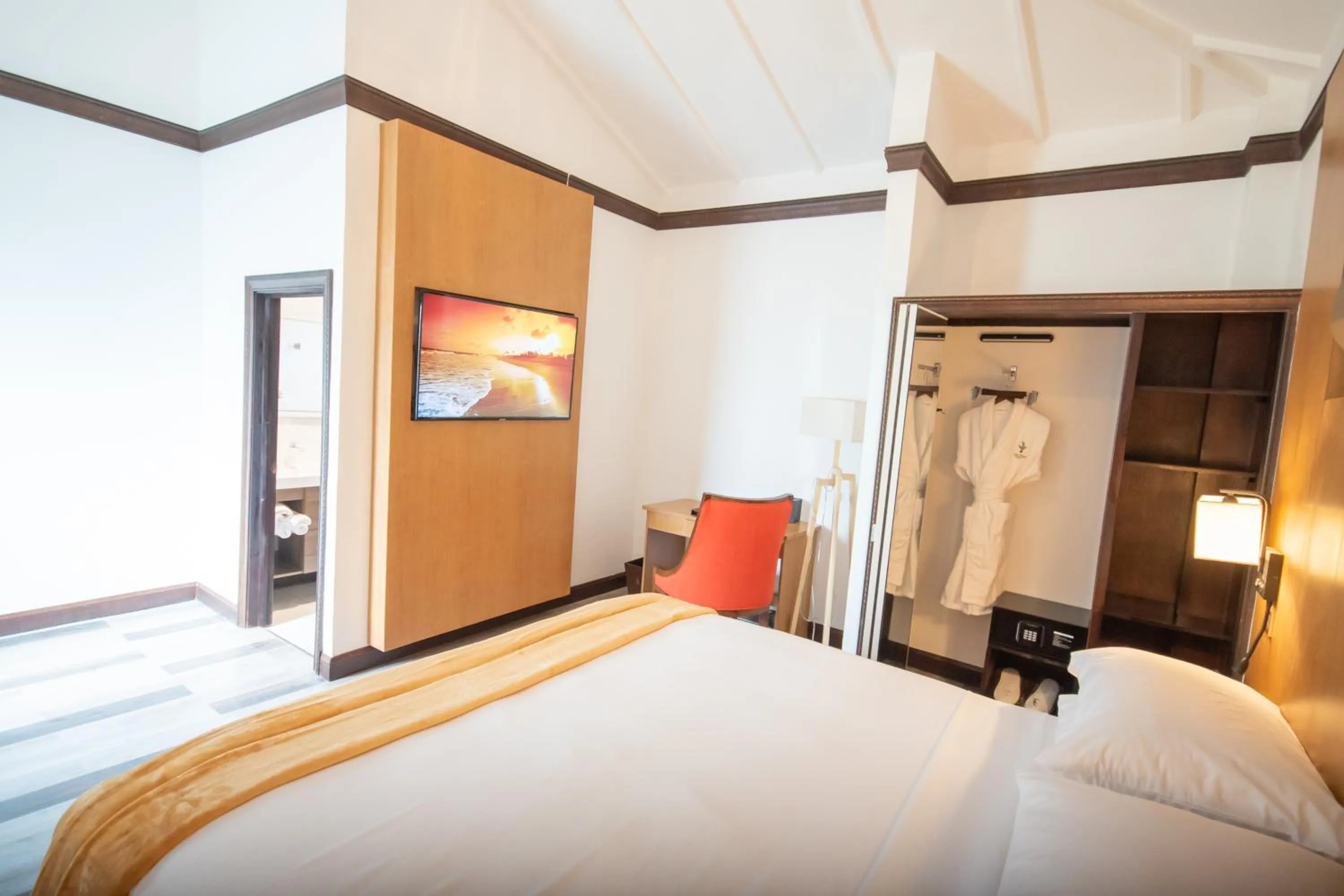 Bed in Sago Palm Hotel