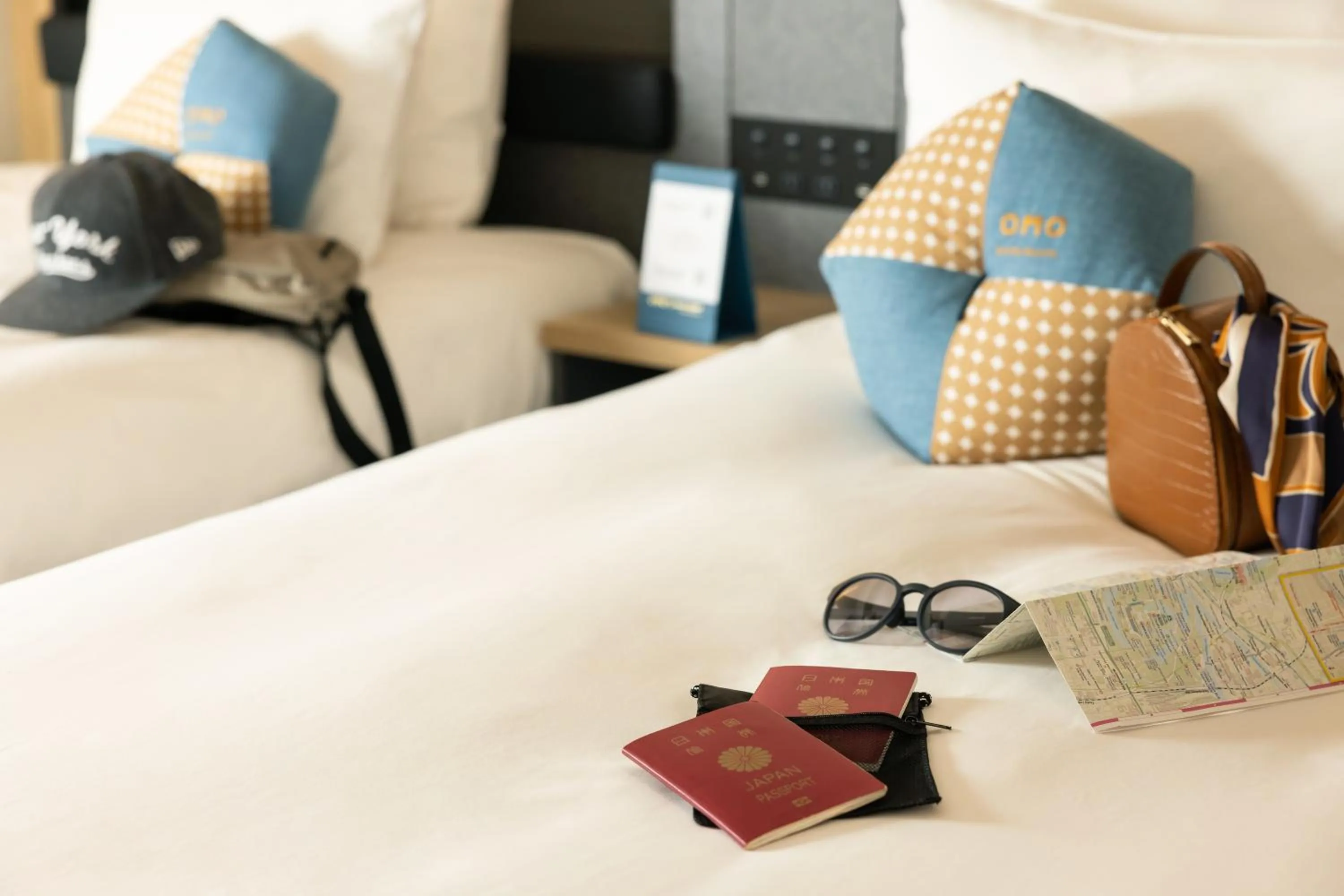 Bed in OMO Kansai Airport by Hoshino Resorts