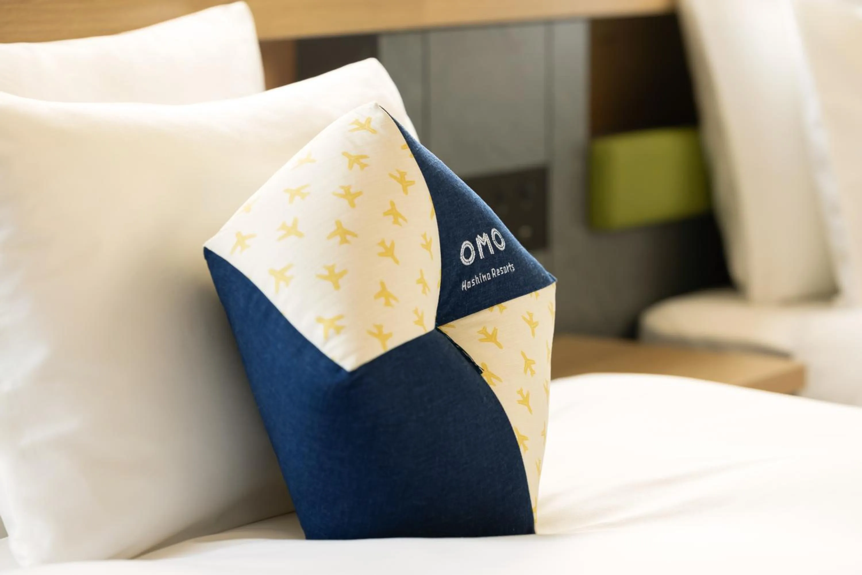 Bed in OMO Kansai Airport by Hoshino Resorts