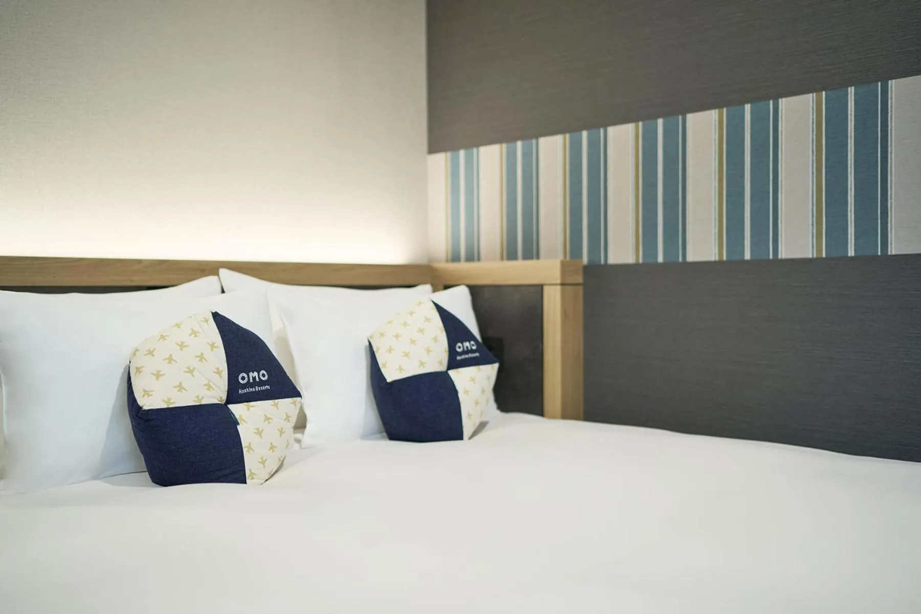 Bed in OMO Kansai Airport by Hoshino Resorts