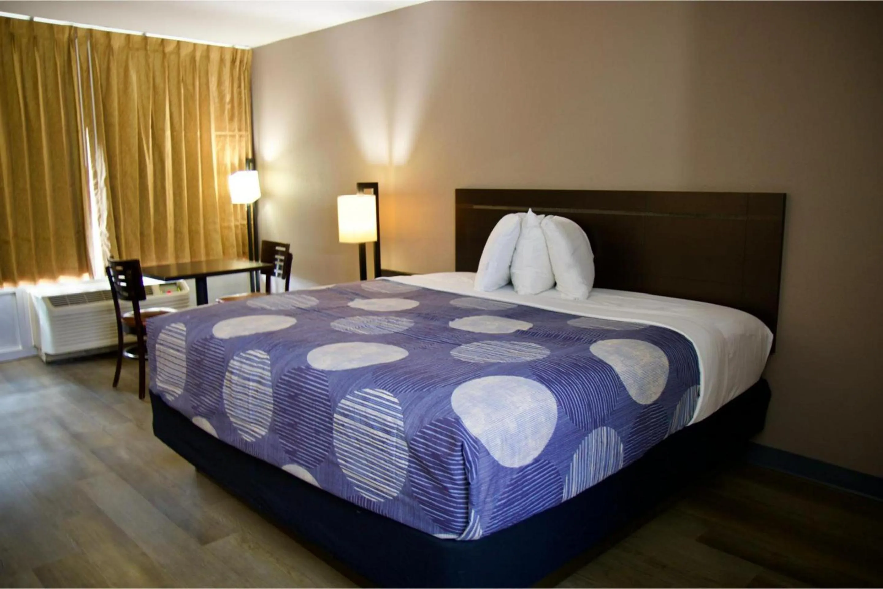 Bedroom, Bed in Heritage Inn & Suites by Capital O Baton Rouge I 10