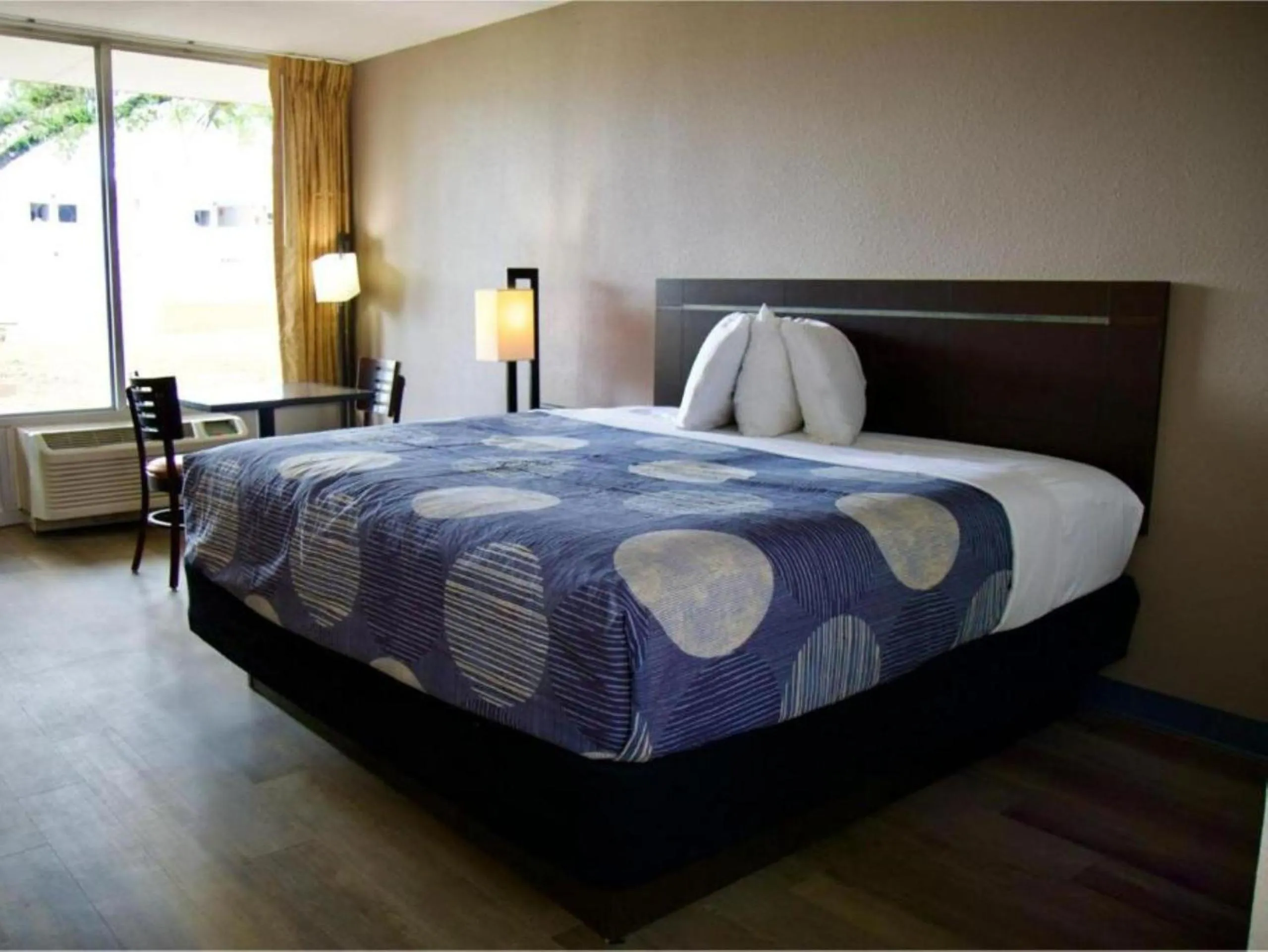 Bedroom, Bed in Heritage Inn & Suites by Capital O Baton Rouge I 10