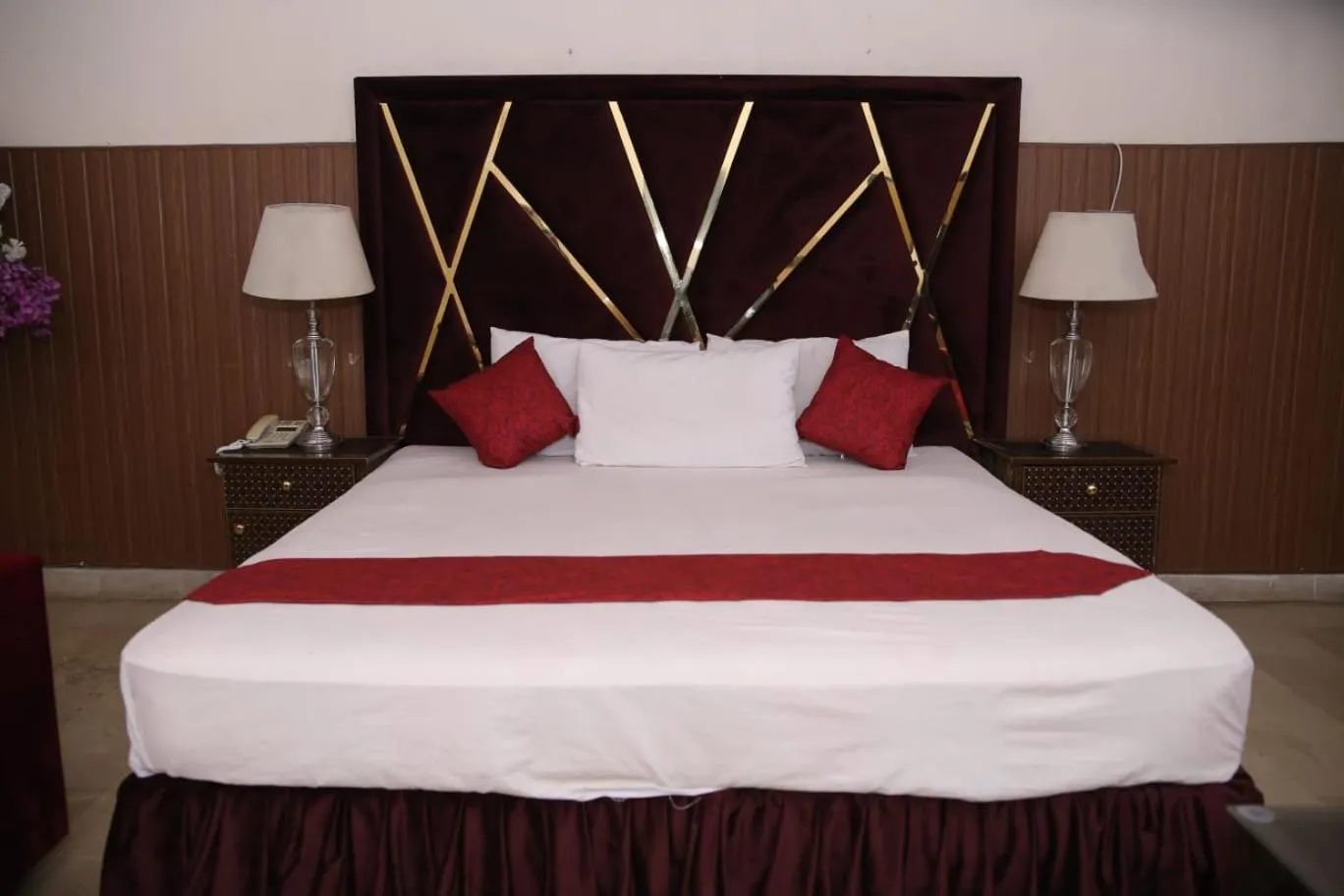 Bed in Green View Hotel Liberty