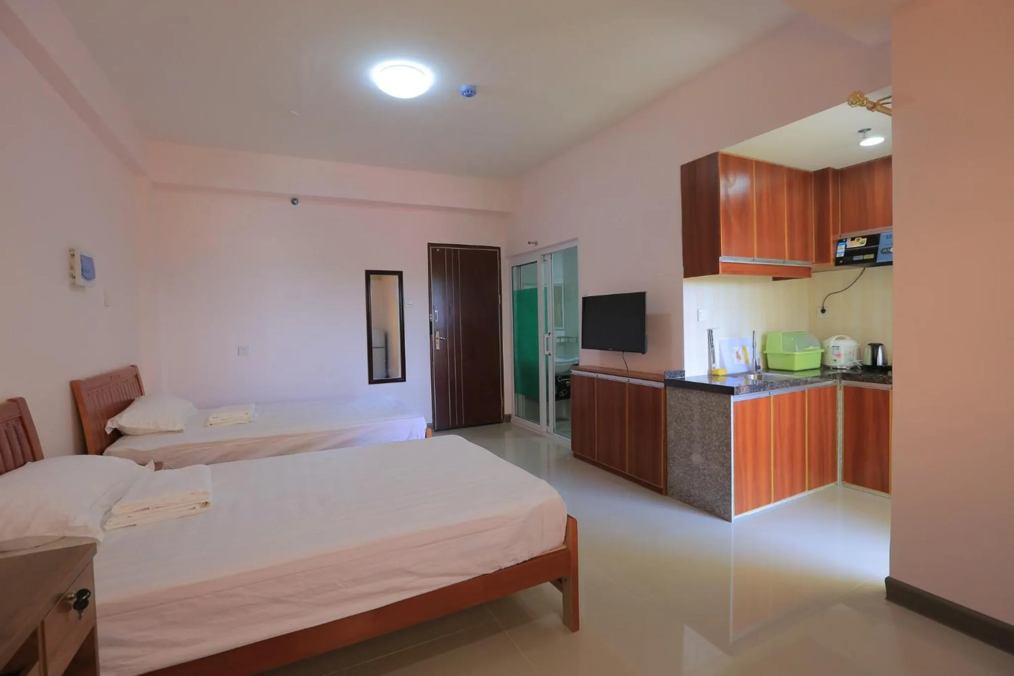 Bed in RUJIA Condotel Corp.