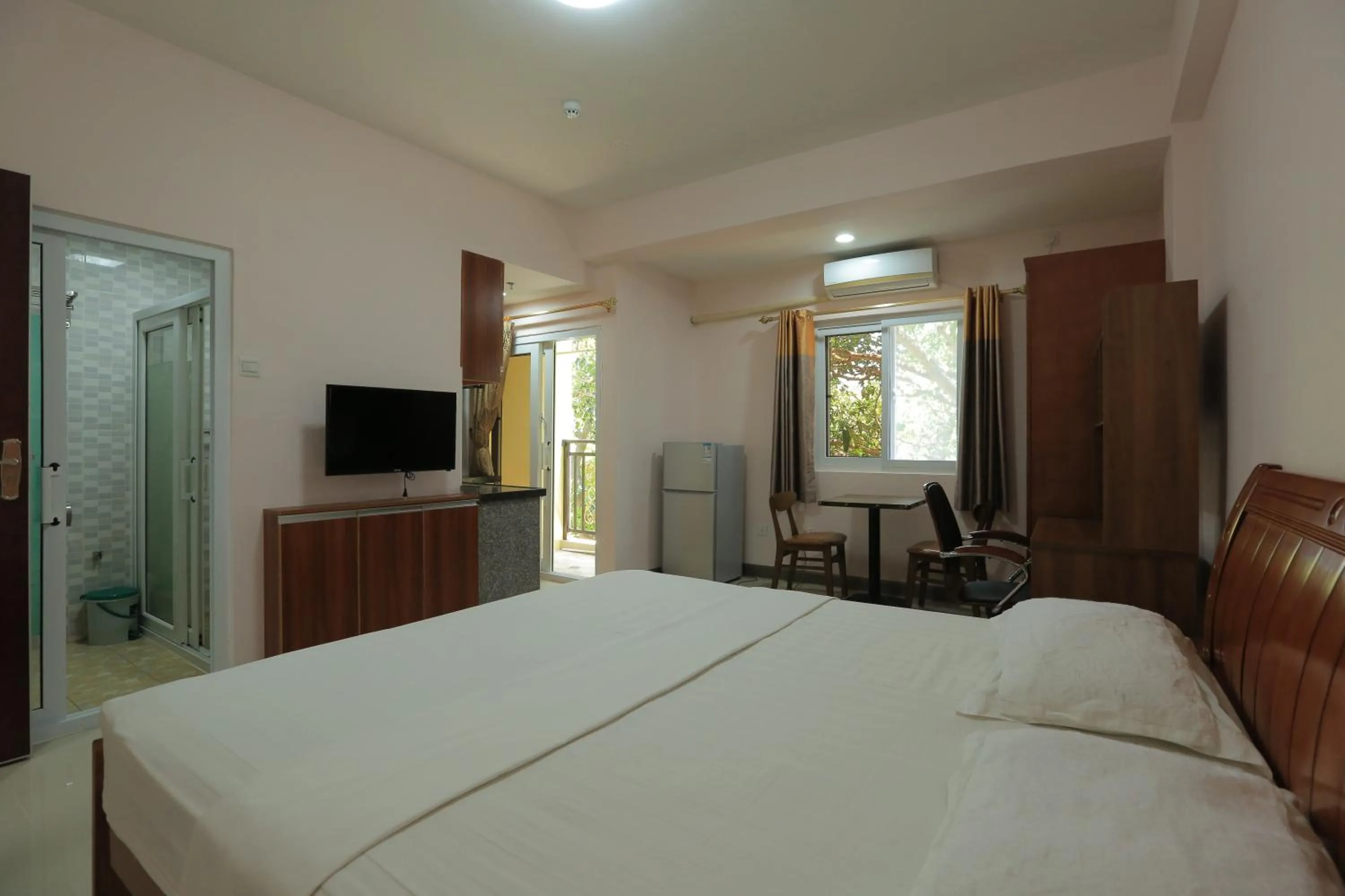 Bed in RUJIA Condotel Corp.