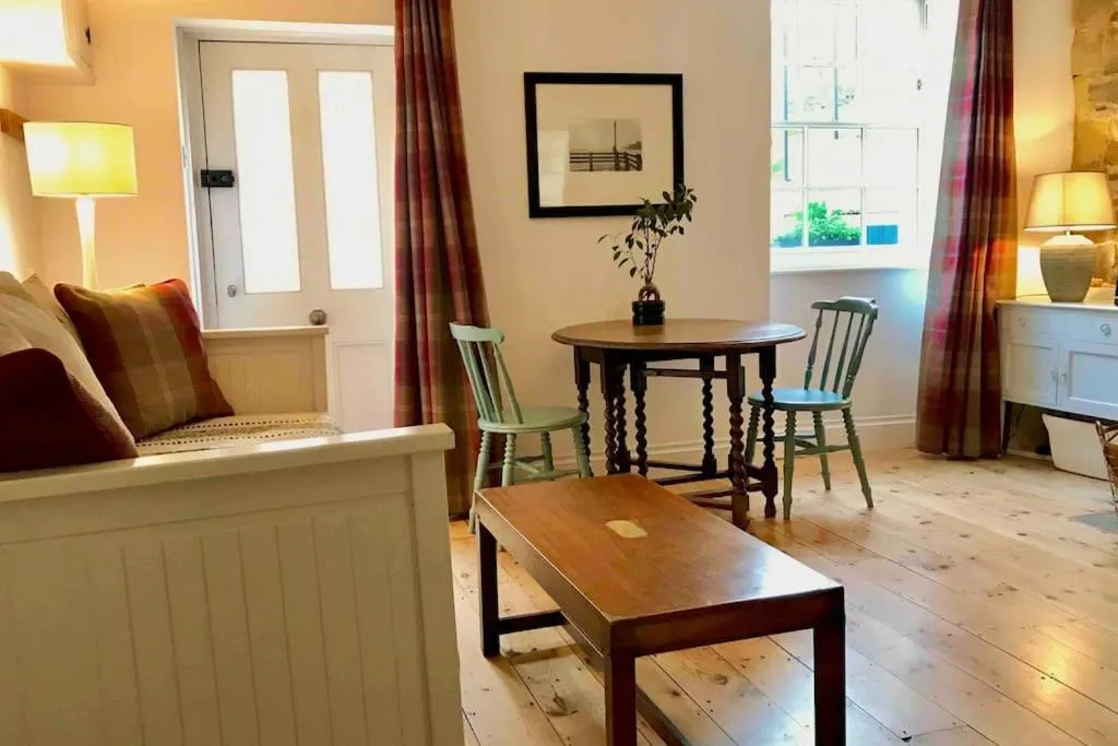 Beachfront apartment with wood burner & courtyard
