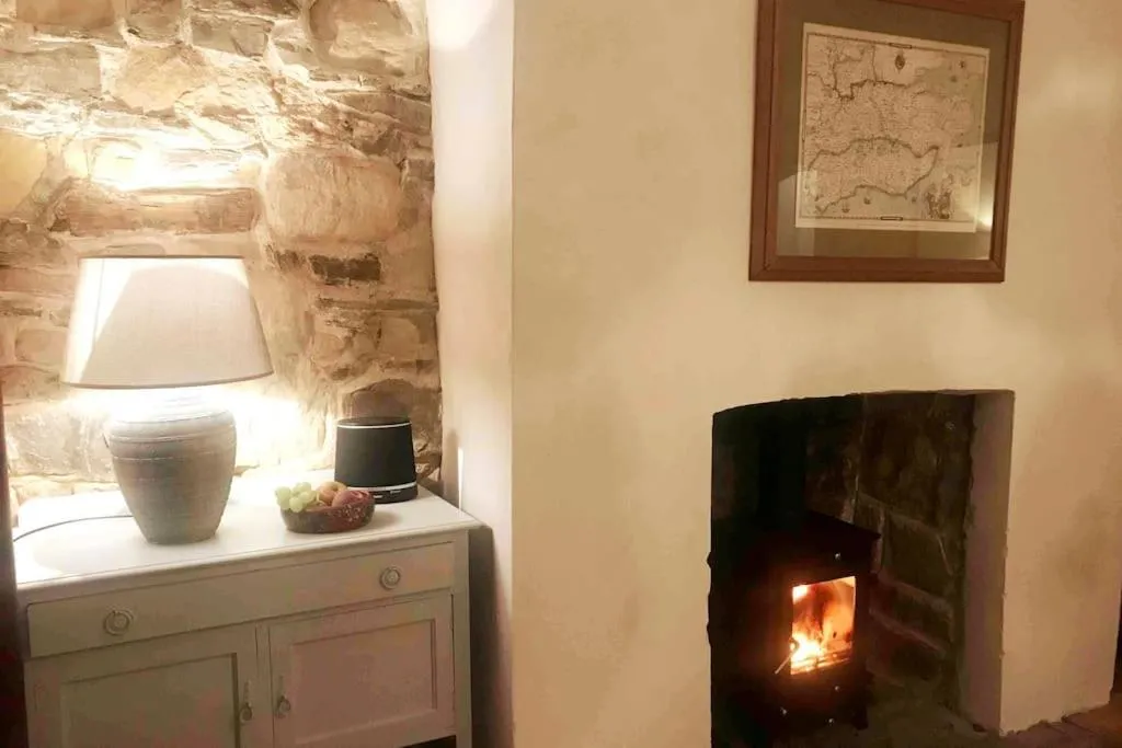 Beachfront apartment with wood burner & courtyard
