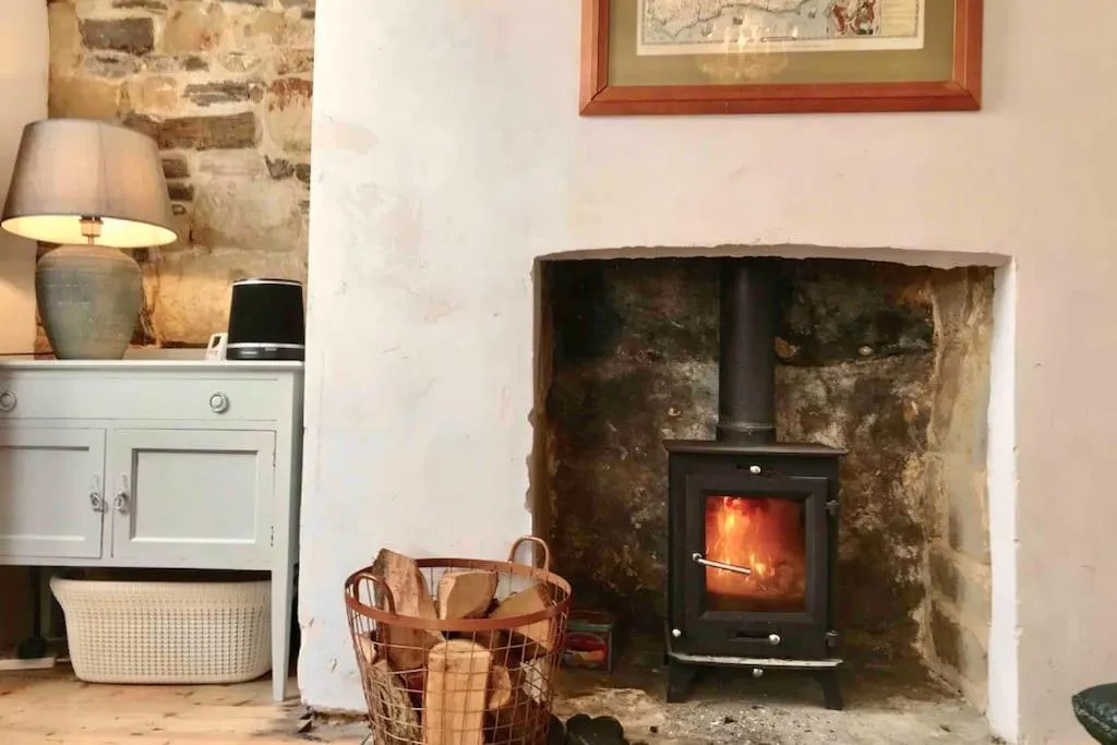 Beachfront apartment with wood burner & courtyard