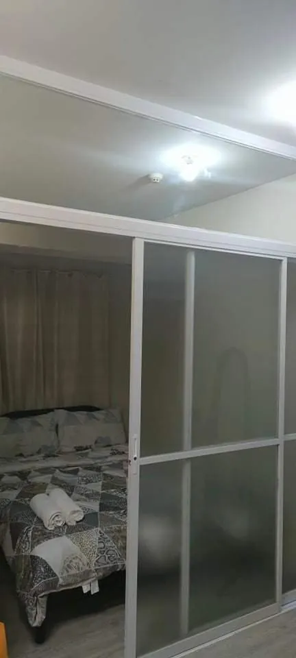 Bed in Staycation Amaia Altaraza Condominium