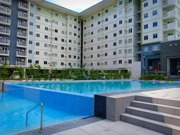 Swimming pool in Staycation Amaia Altaraza Condominium