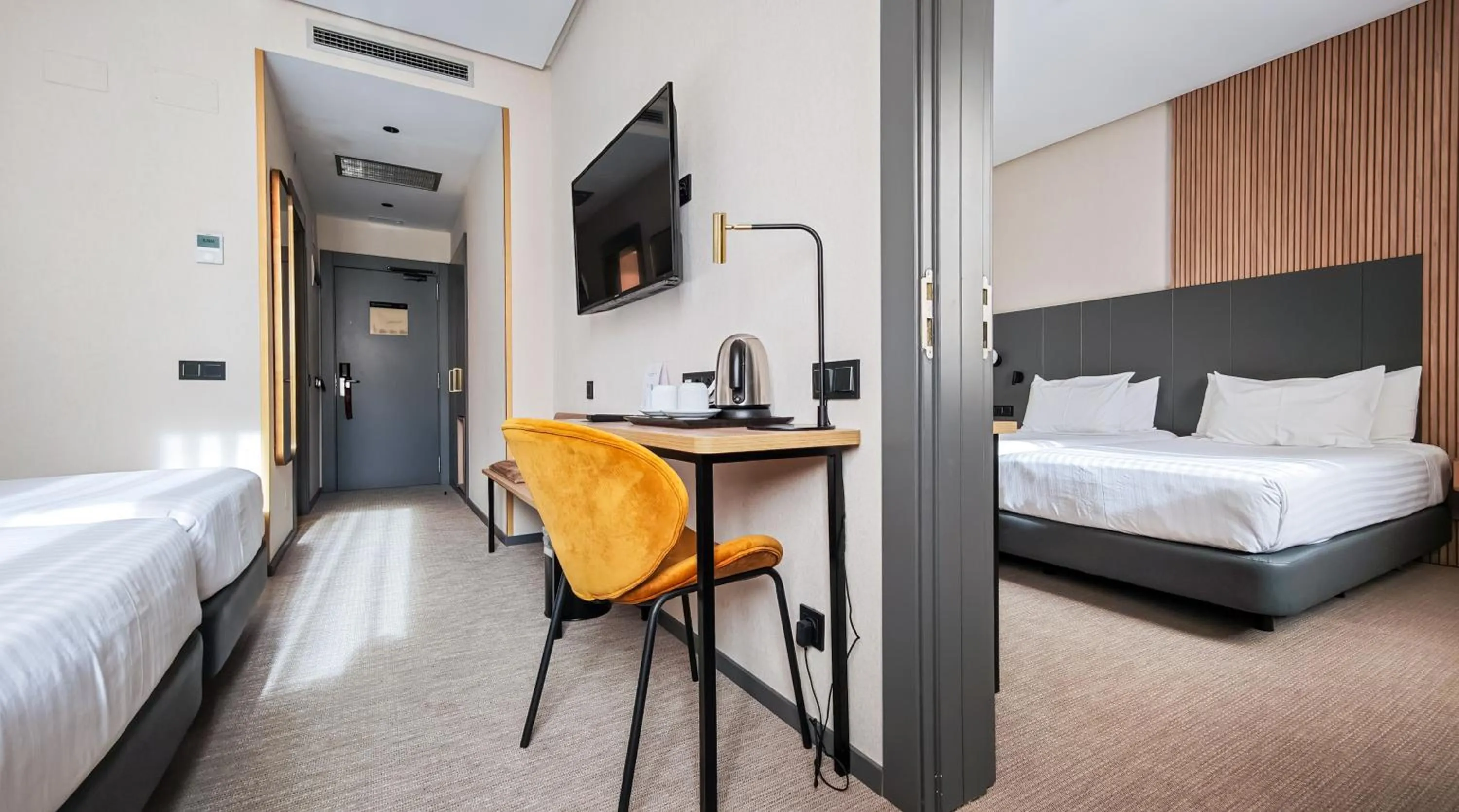 Photo of the whole room, Bed in Silken Ciudad Gijón