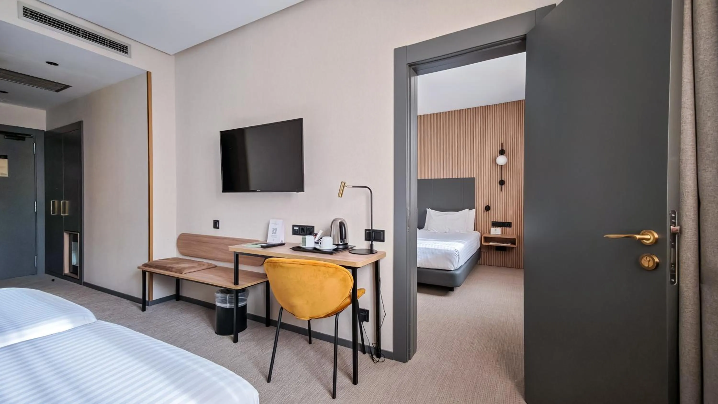 Photo of the whole room, Bed in Silken Ciudad Gijón