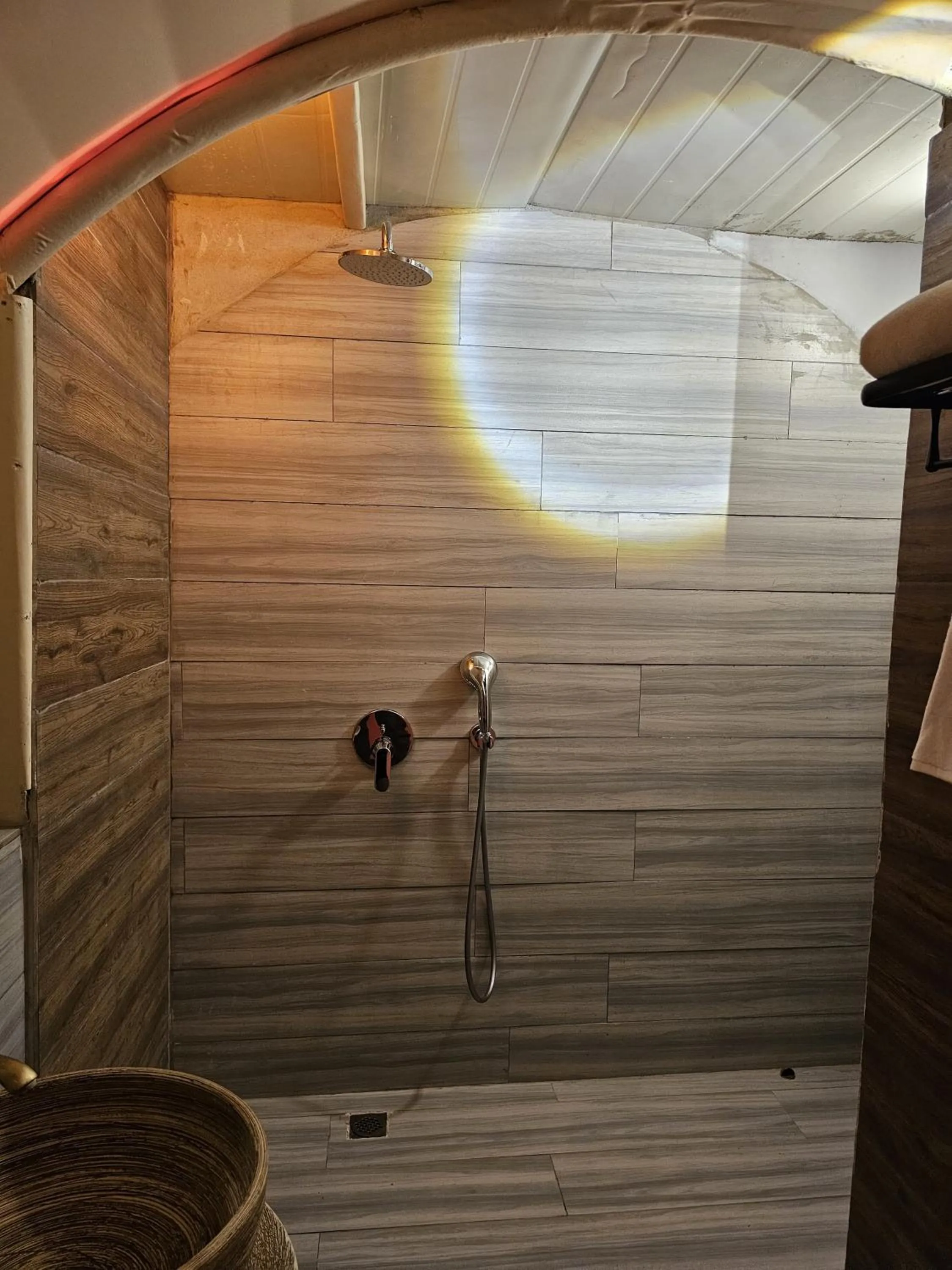 Shower in Nirvana Retreat By Patanjali Wellness Initiative