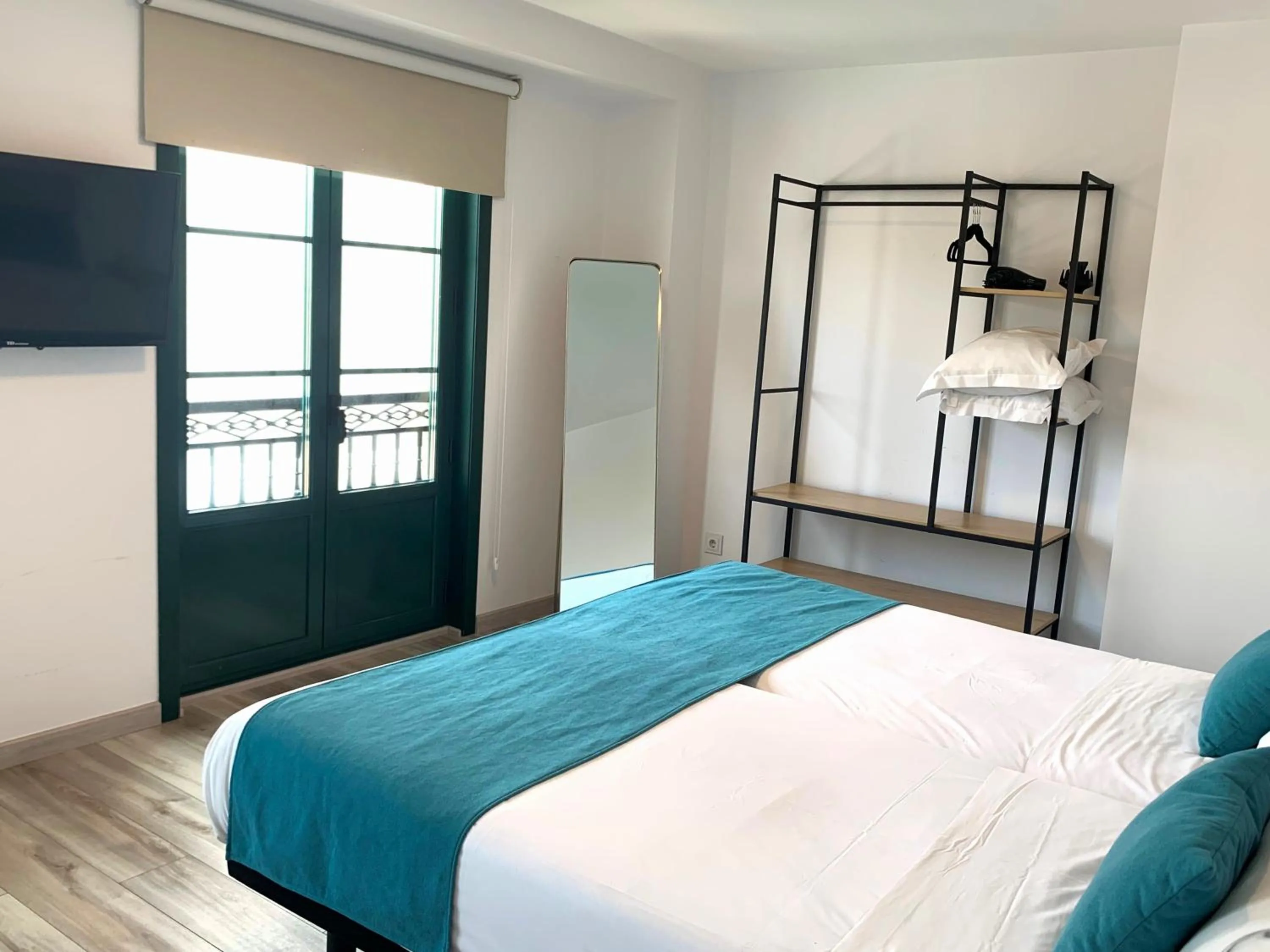 Photo of the whole room, Bed in Hotel Pombal Rooms