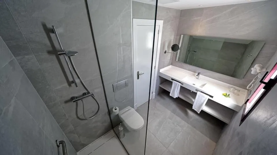 Bathroom in Broncemar Beach Suites