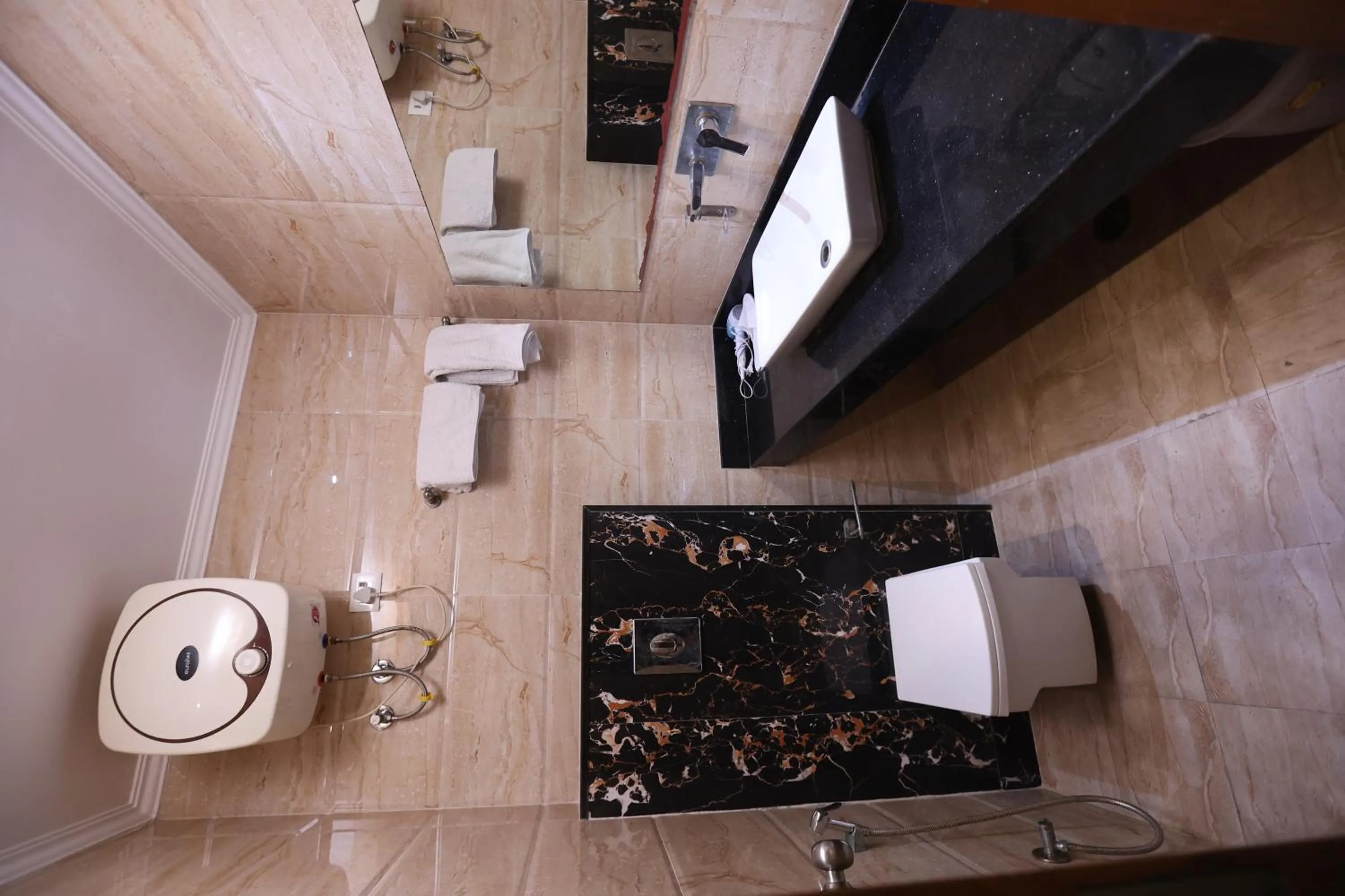 Shower in The Elevate Hotel Near Delhi Airport With- Free Airport PICKUP