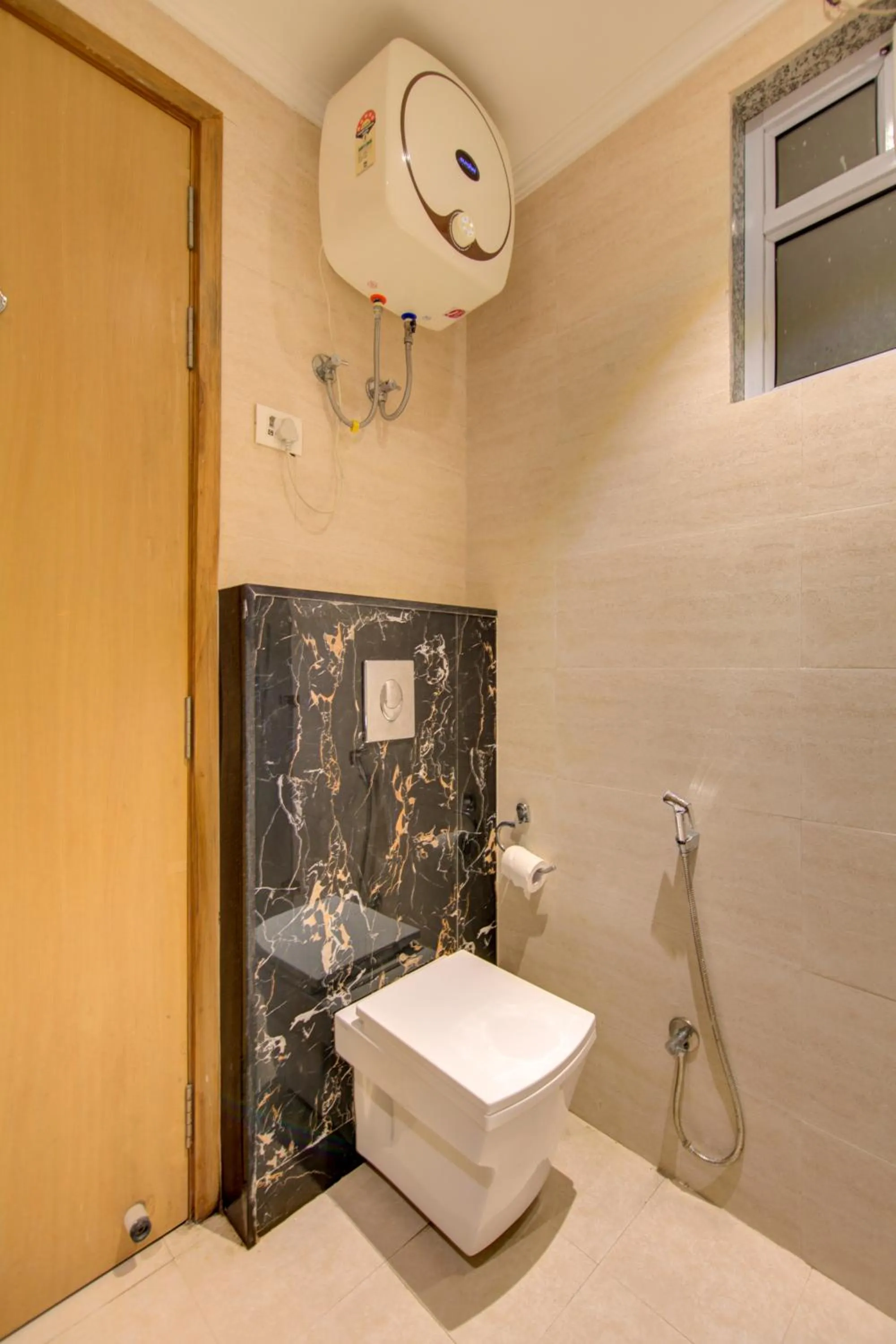 Shower in The Elevate Hotel Near Delhi Airport With- Free Airport PICKUP