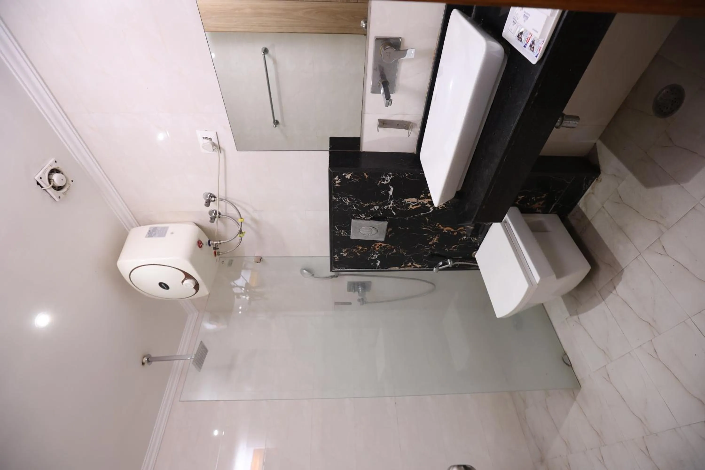 Shower in The Elevate Hotel Near Delhi Airport With- Free Airport PICKUP