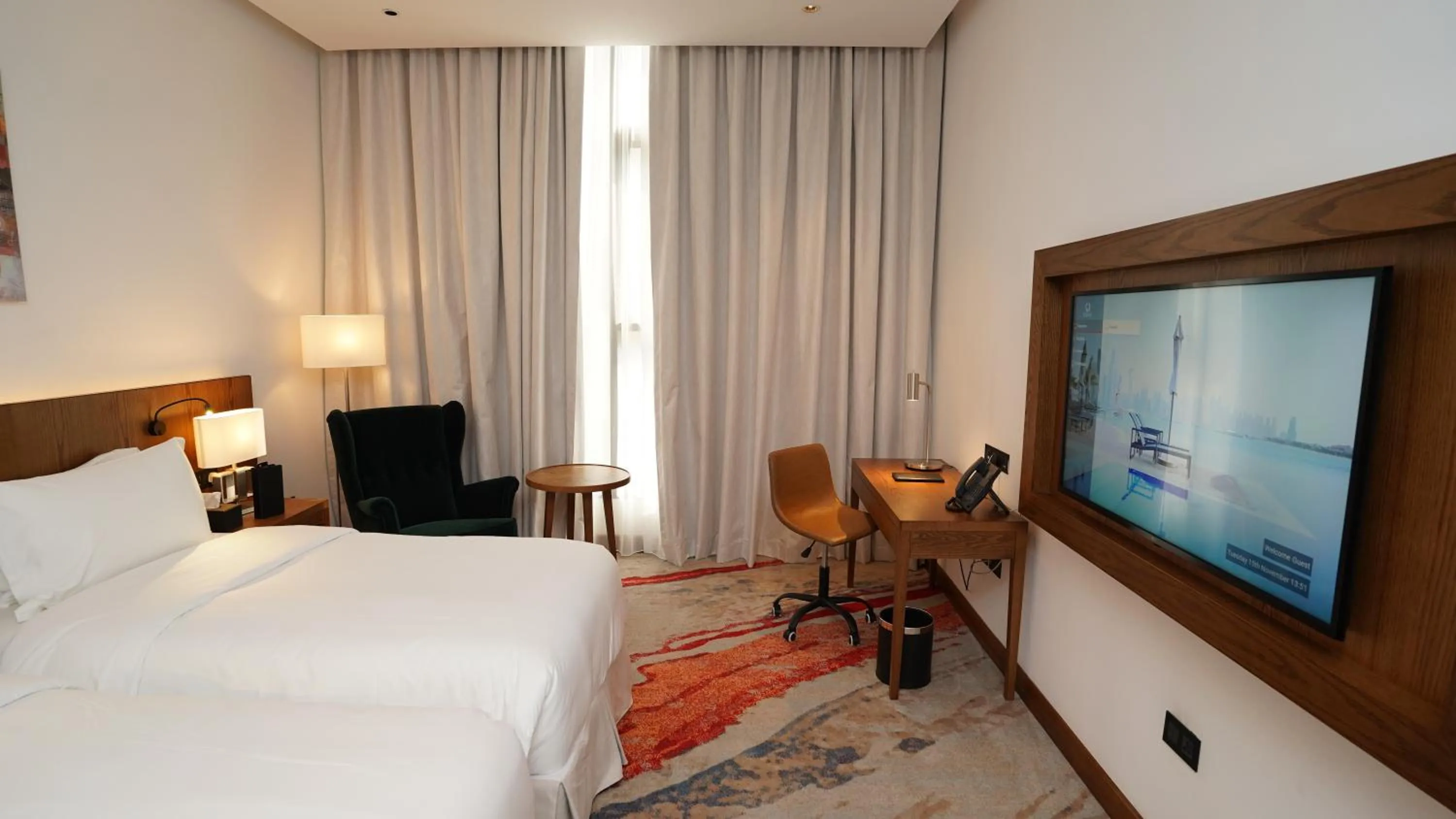 Bed in Jasmine Garden Hotel